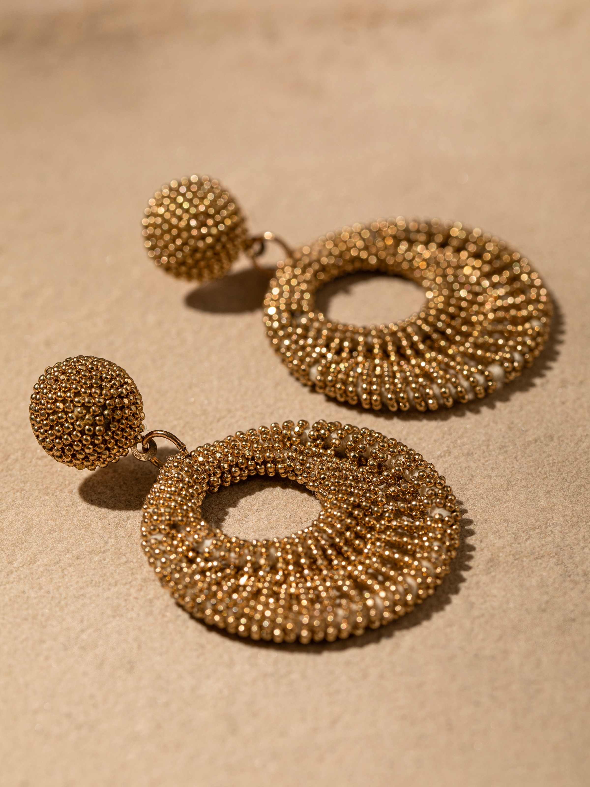 Detailed view of Handcrafted drop earrings highlighting intricate design and superior quality