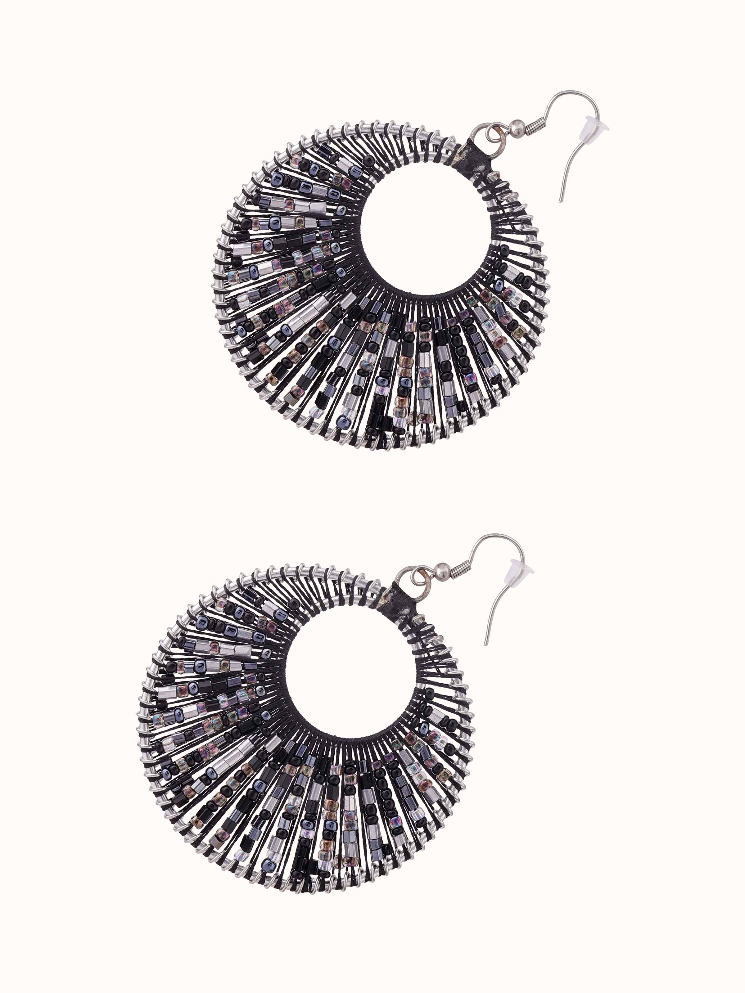 Detailed view of Handcrafted drop earrings emphasizing unique design elements and quality craftsmanship