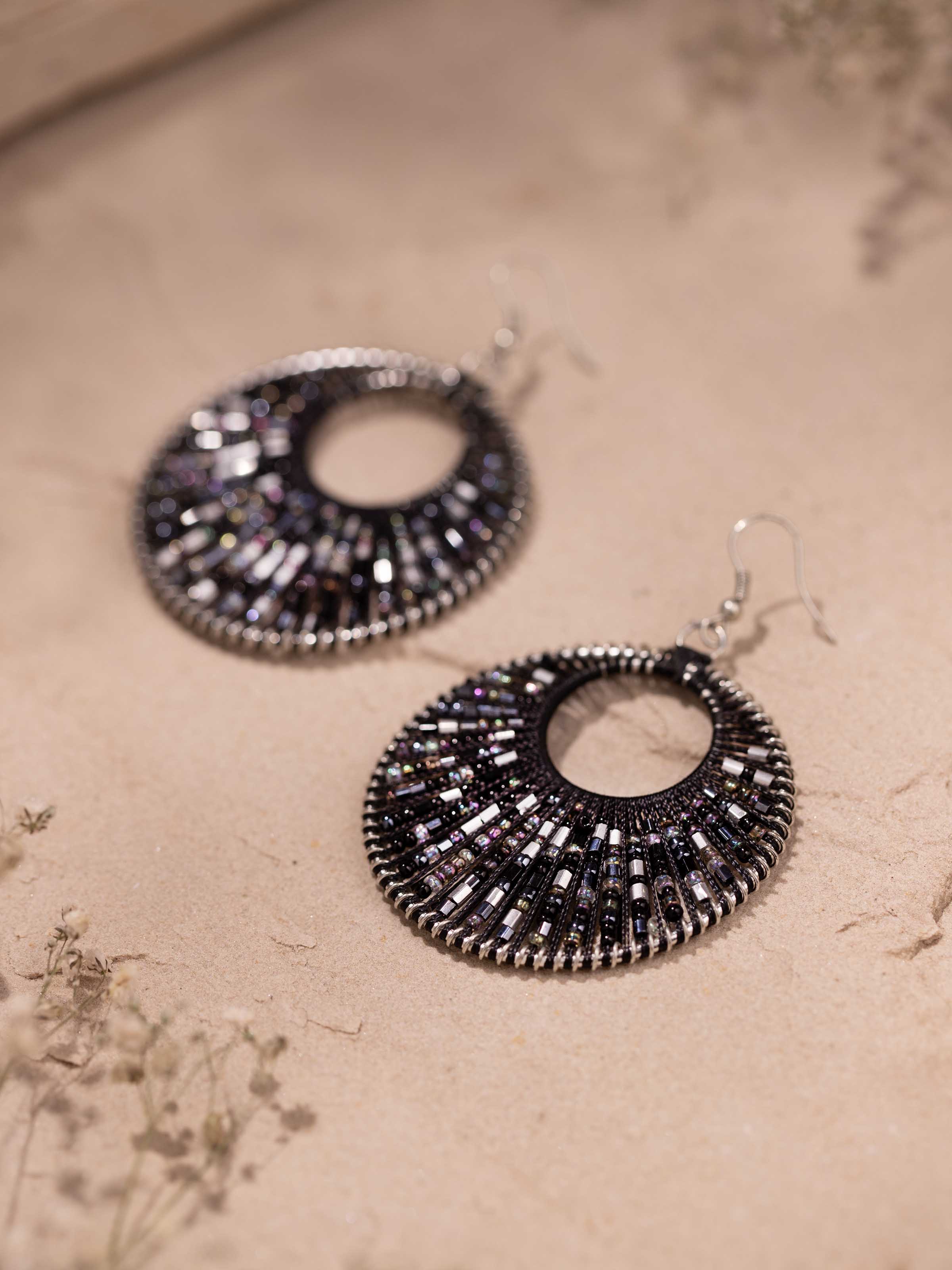 Overhead view of Handcrafted drop earrings showcasing overall design and craftsmanship
