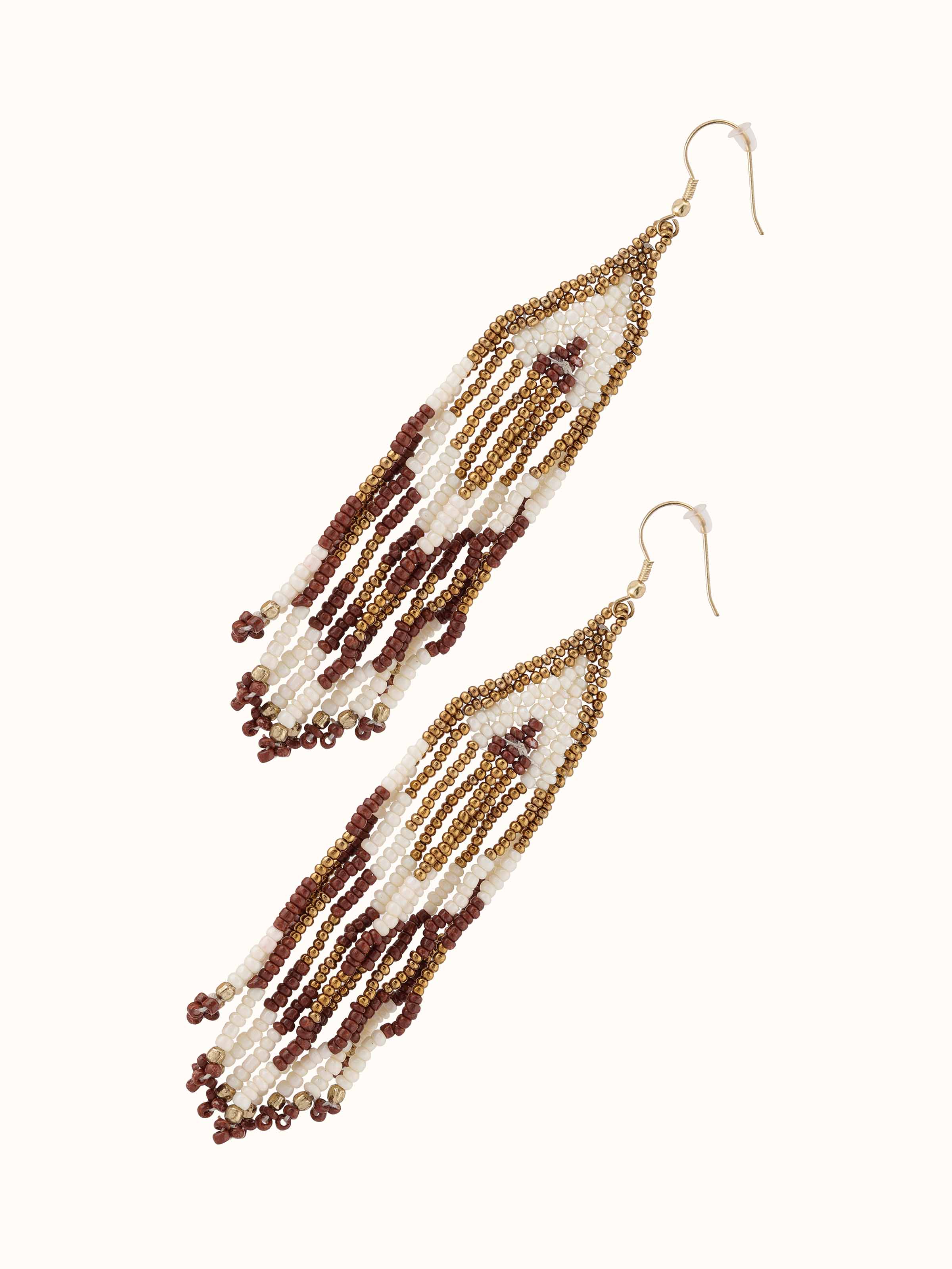 Angled view of handcrafted drop earrings highlighting their unique features.