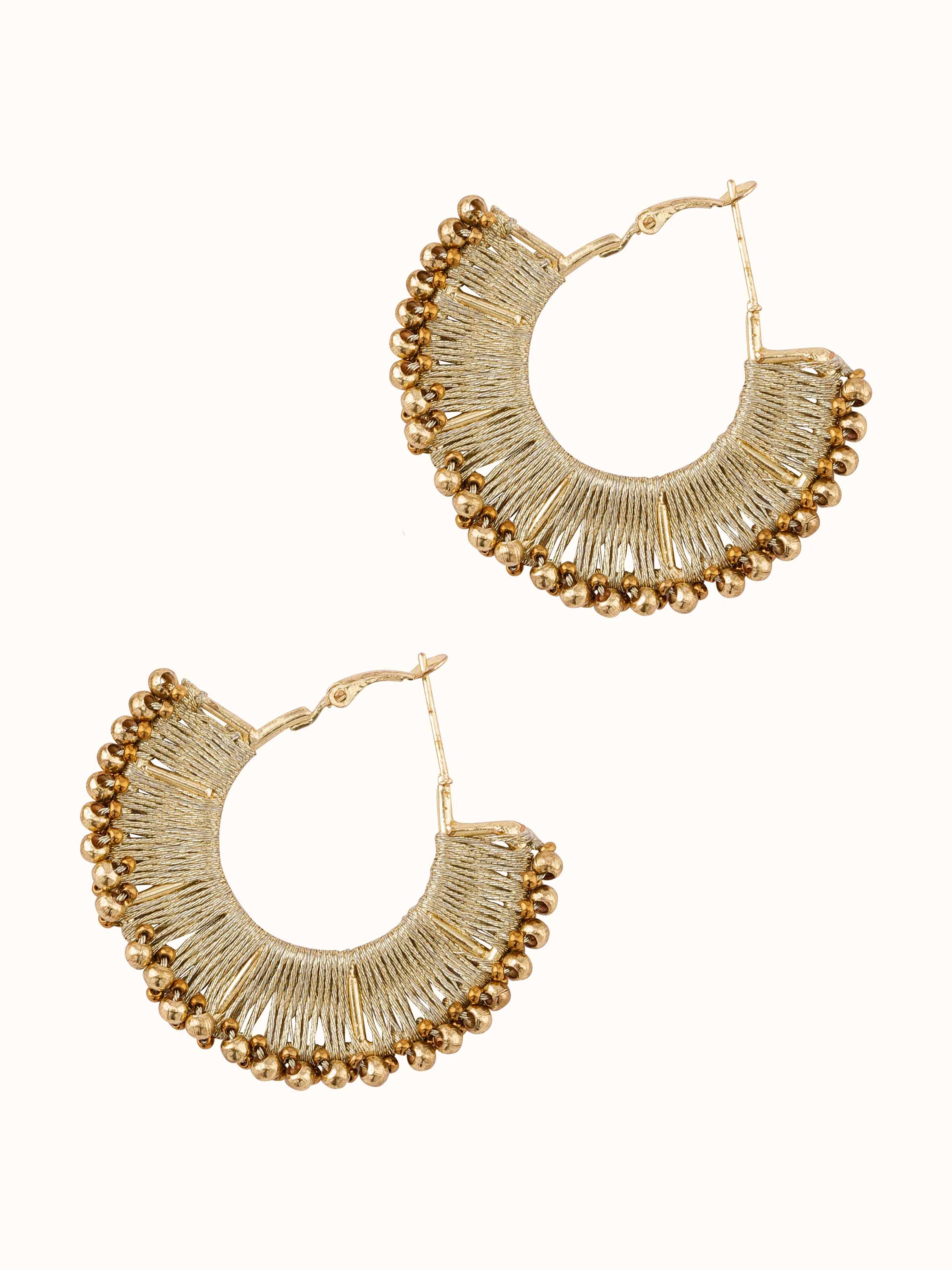 Angled view of Handcrafted Hoop Earrings showcasing the hoop design and fine metalwork.