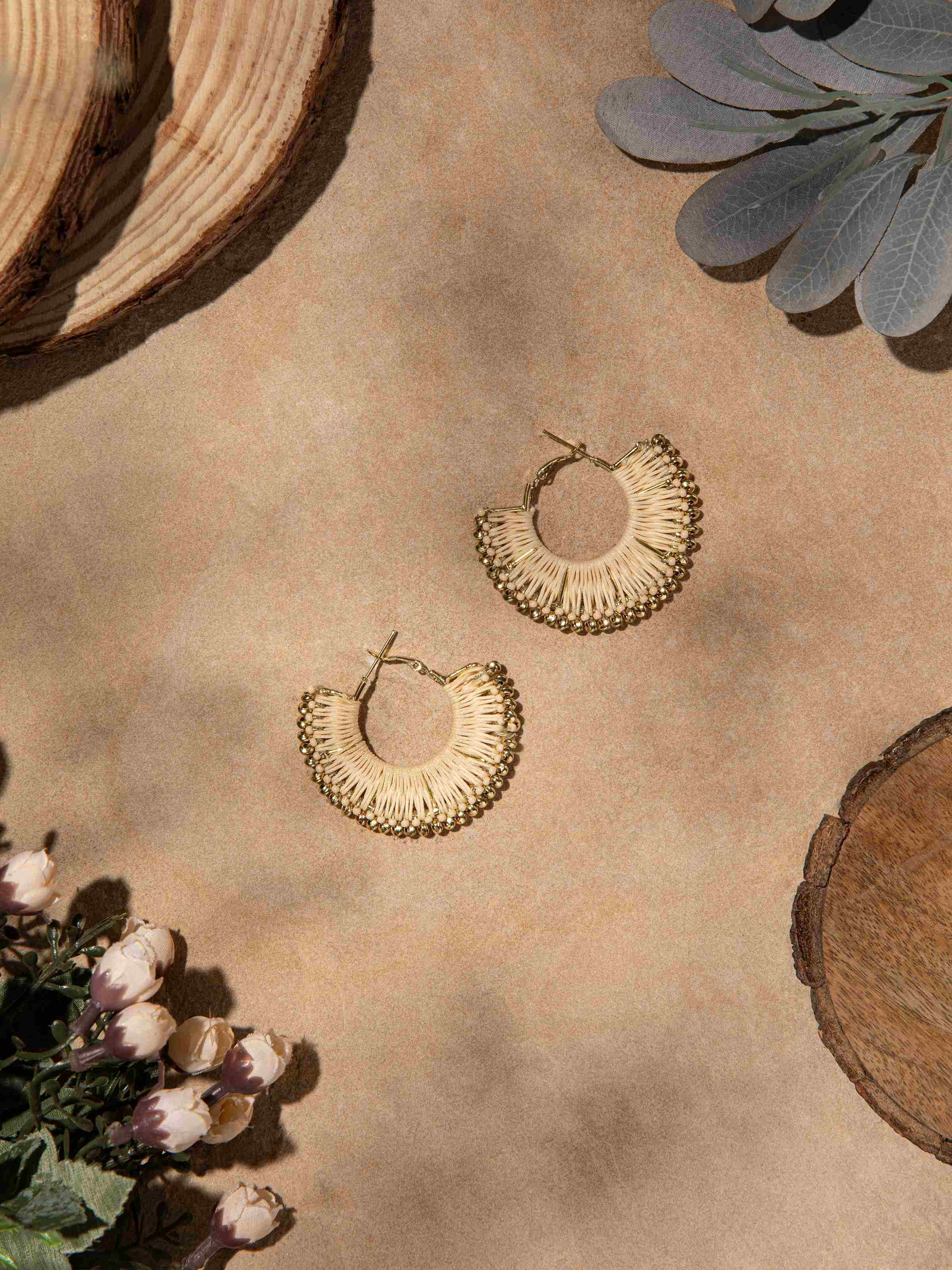 Close-up view of Handcrafted hoop earrings focusing on their intricate design and high-quality finish