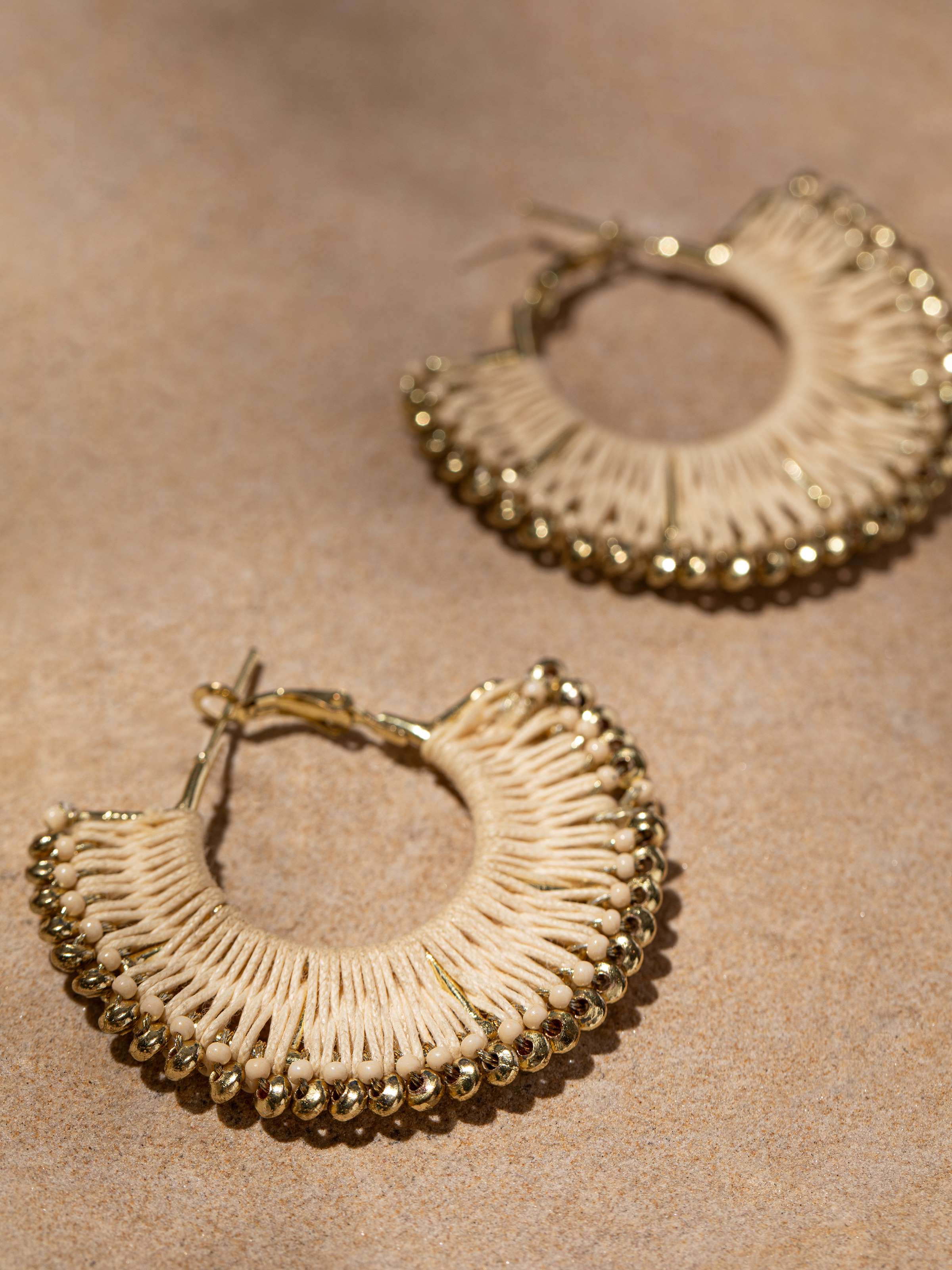 Detailed front view of Handcrafted hoop earrings showcasing their elegant design and artisanal craftsmanship