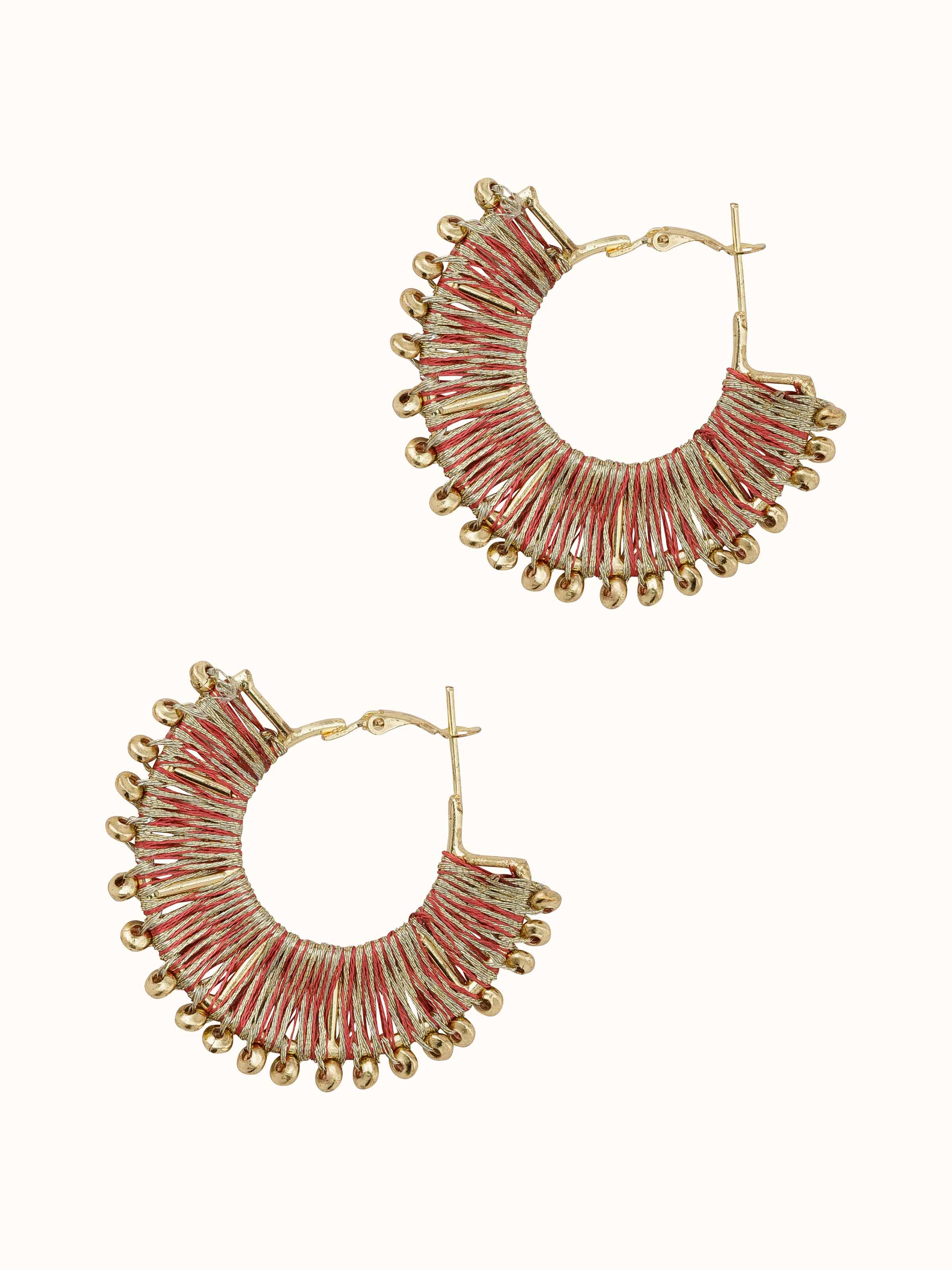 Angled view of Handcrafted Hoop Earrings emphasizing the craftsmanship and detail.