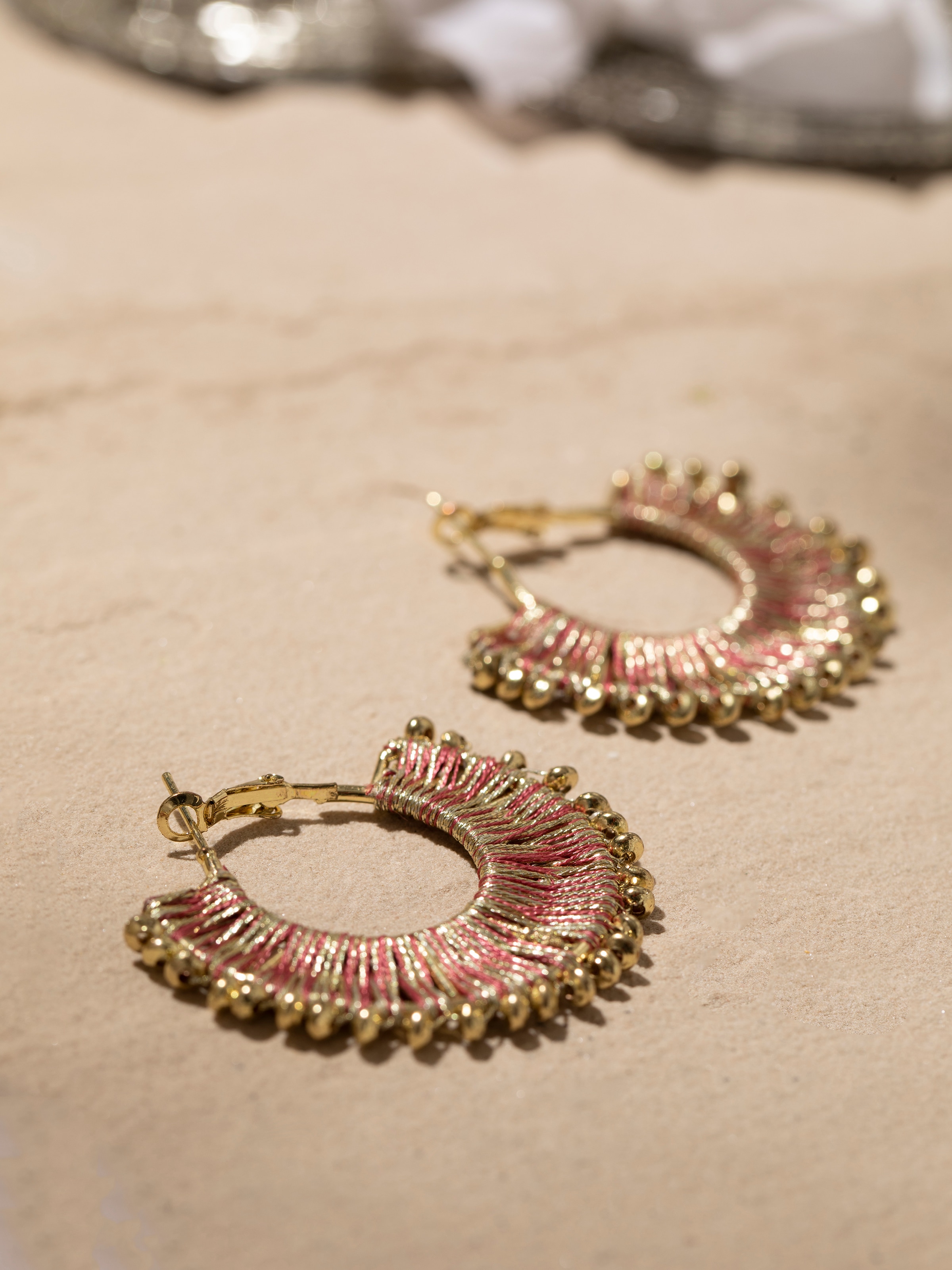 Back view of Handcrafted Hoop Earrings showing clasp and design details.