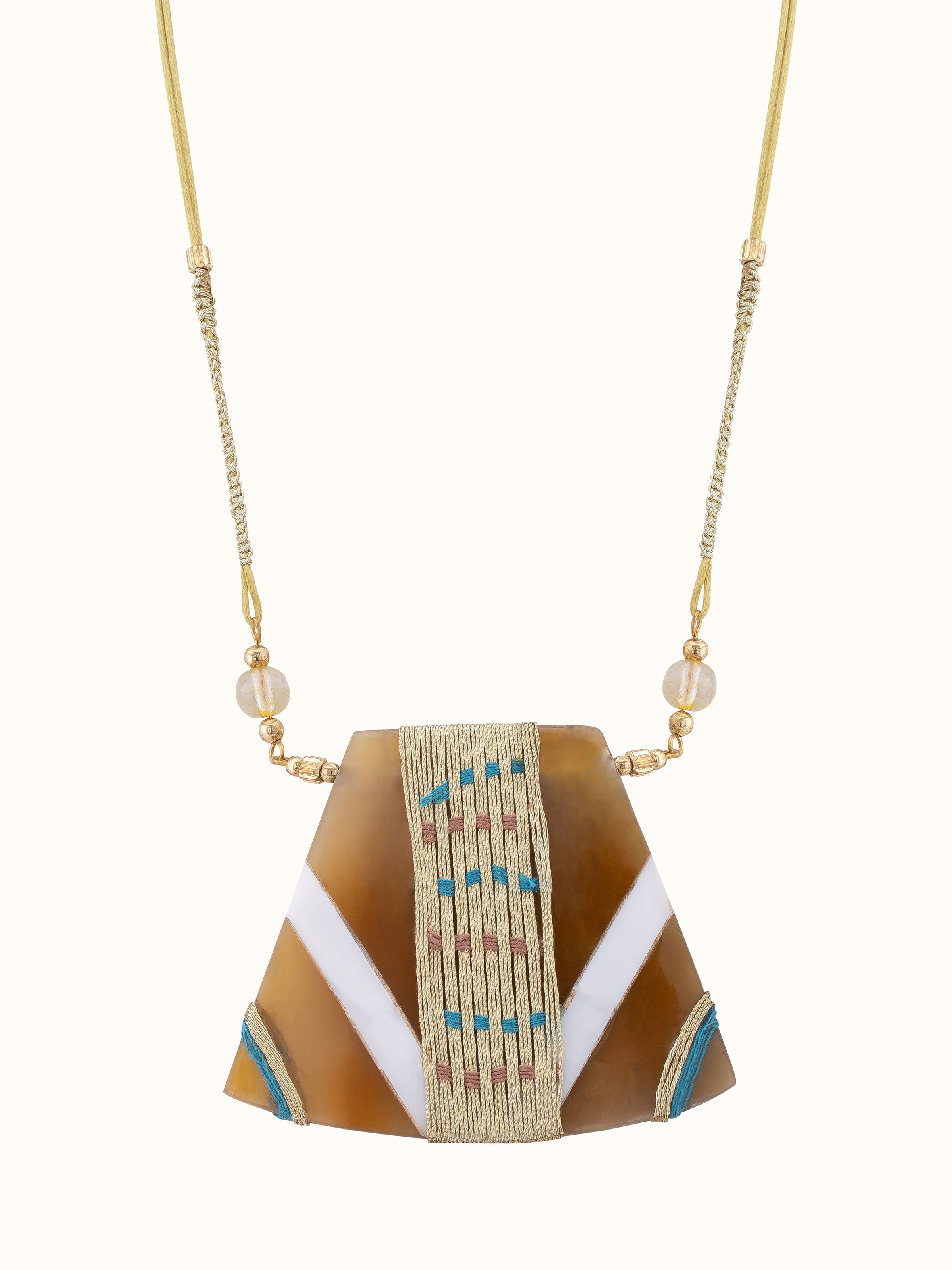 Front view of handcrafted long necklace showcasing its elegant design and artisanal craftsmanship.