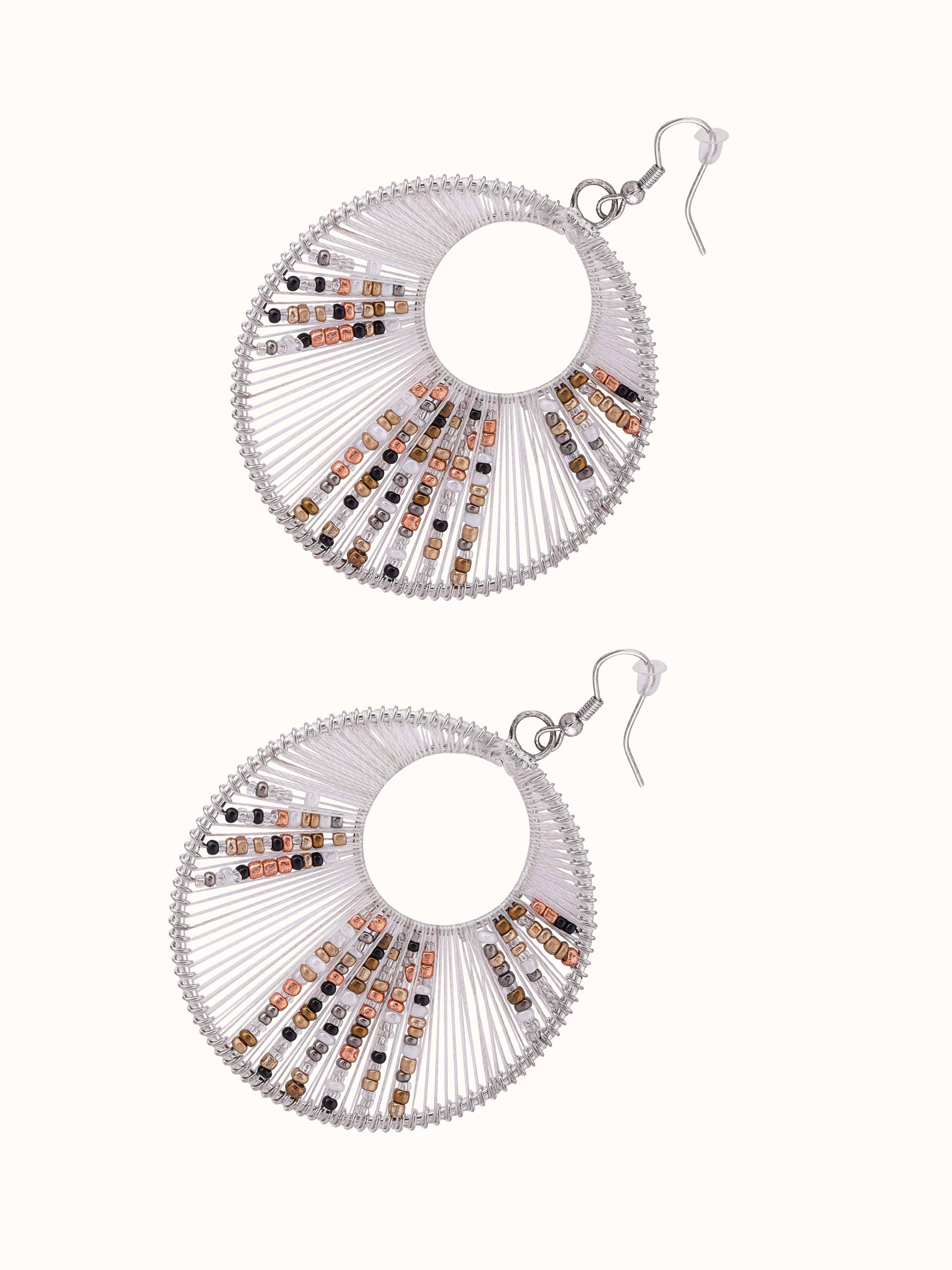 Angled view of handcrafted drop earrings showcasing the overall design and craftsmanship.