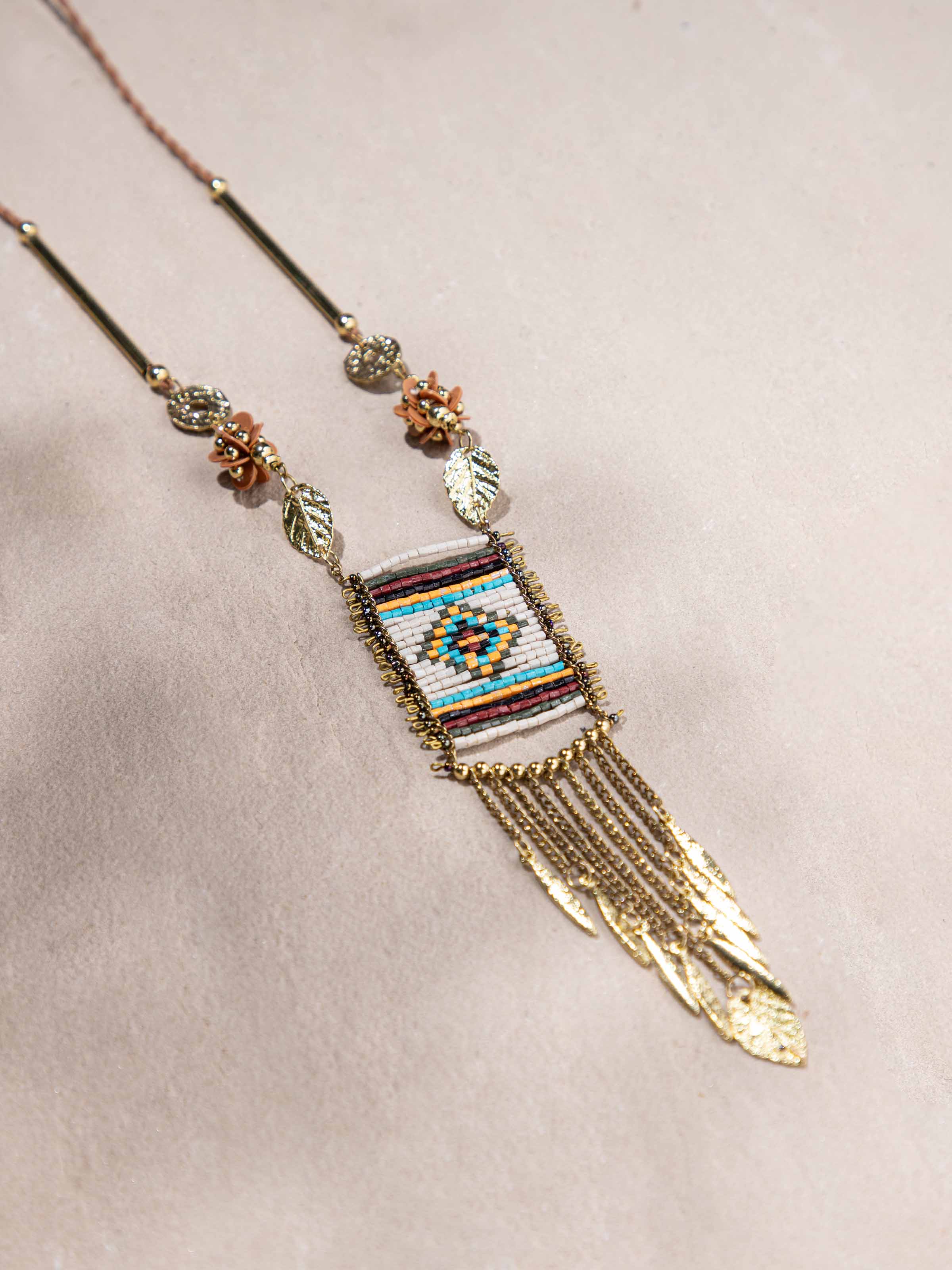 Detailed view of Handcrafted Long Necklace with a focus on its intricate patterns and luxurious feel