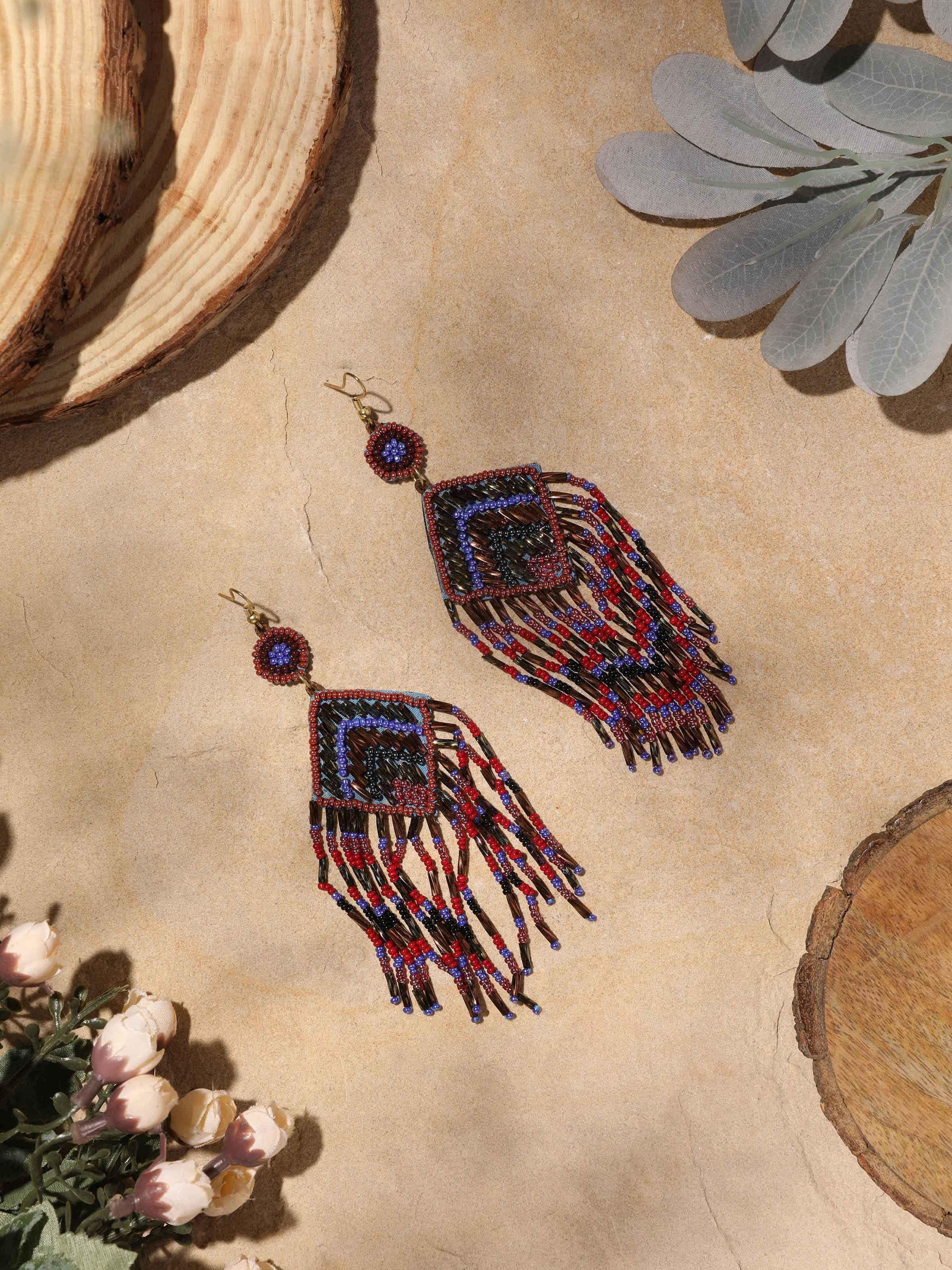 Close-up view of Handcrafted Drop Earrings showcasing intricate metalwork and fine craftsmanship.