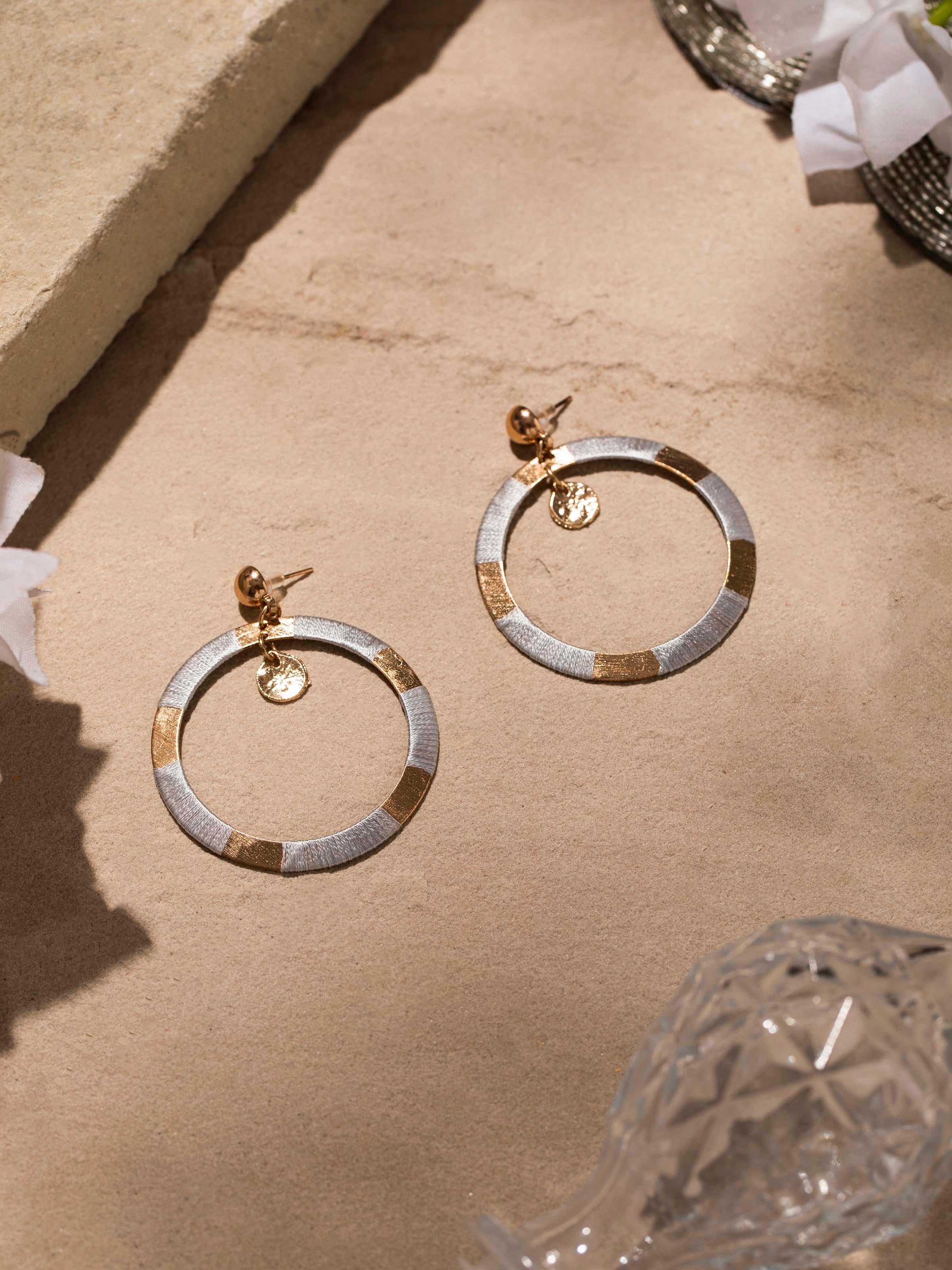 Side view of Handcrafted Drop Earrings showing the elegant drop design and detailing.