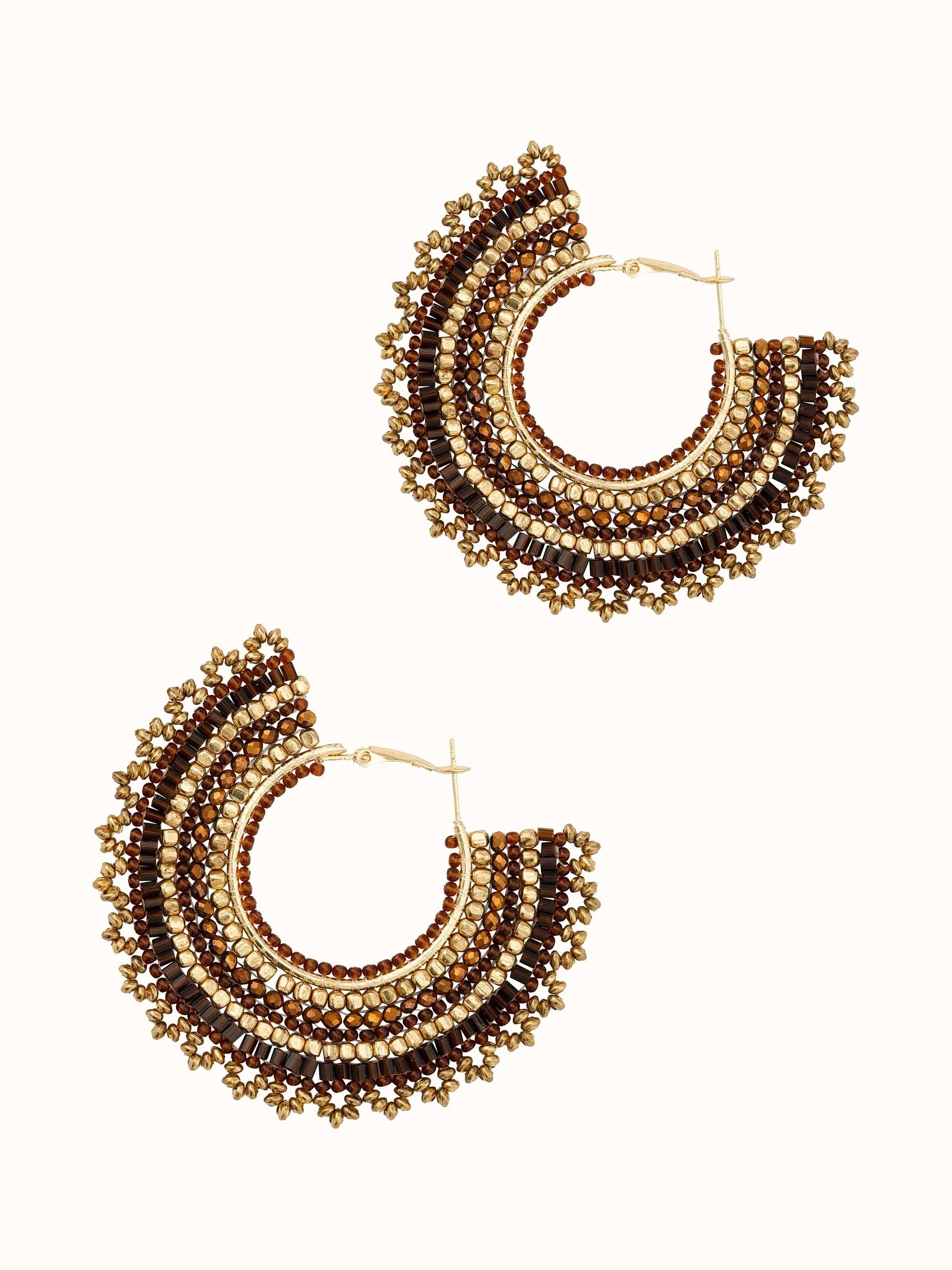 Angled view of Handcrafted Hoop Earrings emphasizing the elegant design.