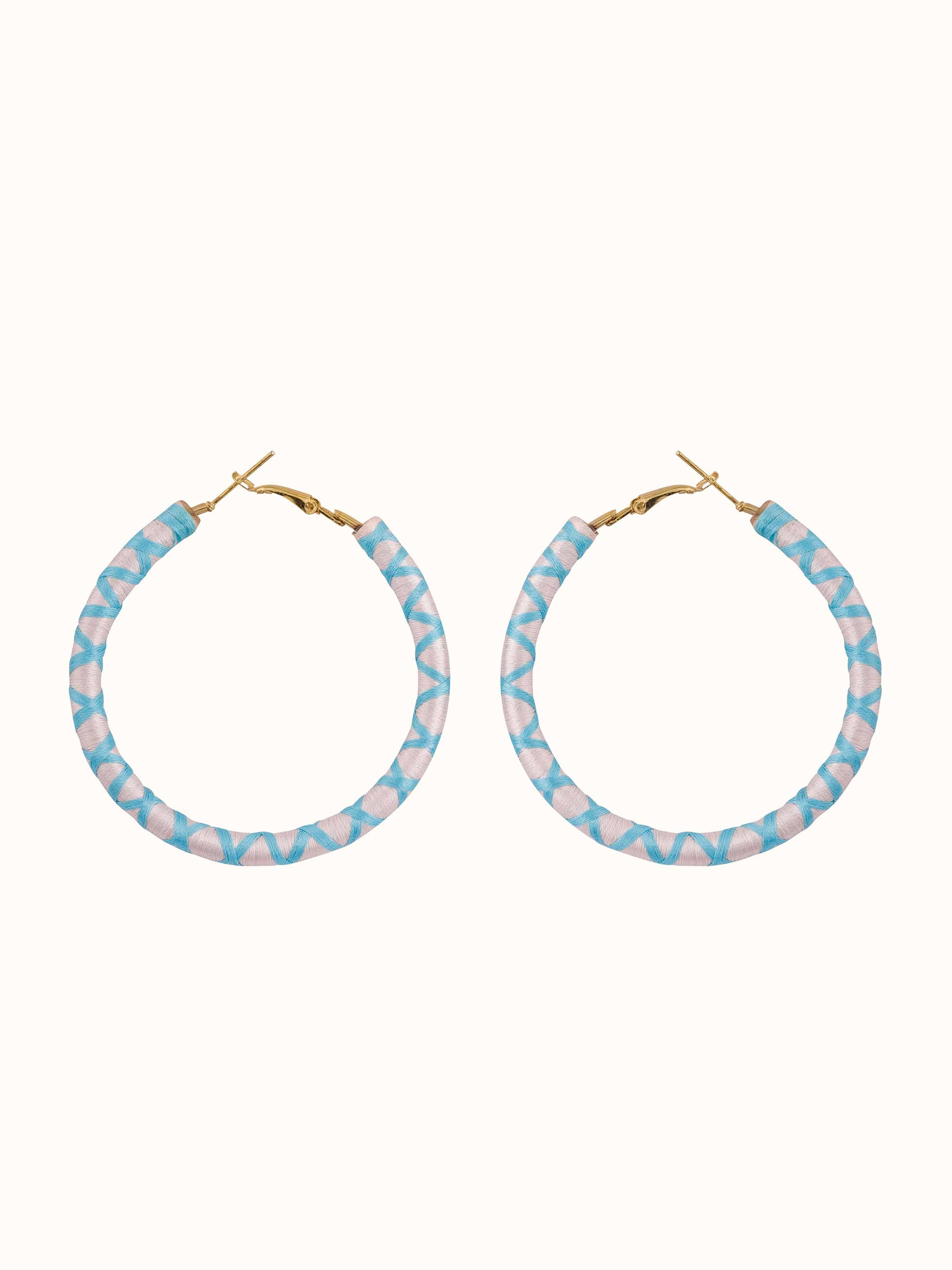 Front view of handcrafted hoop earrings showcasing their elegant hoop design and craftsmanship.