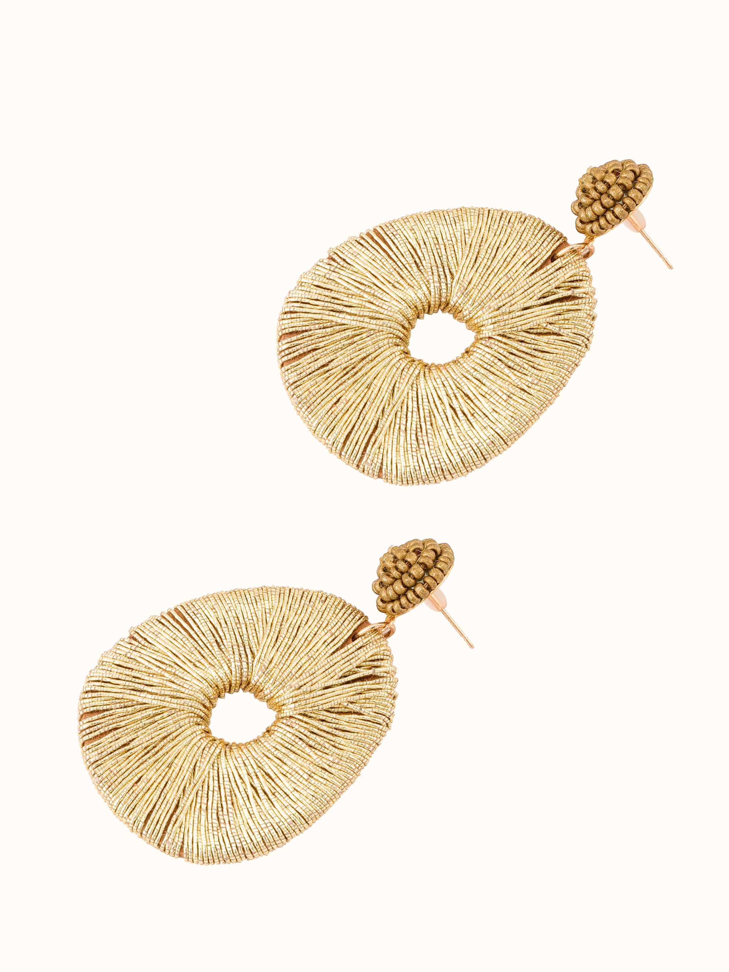 Angled view of Handcrafted Drop Earrings emphasizing their intricate details.