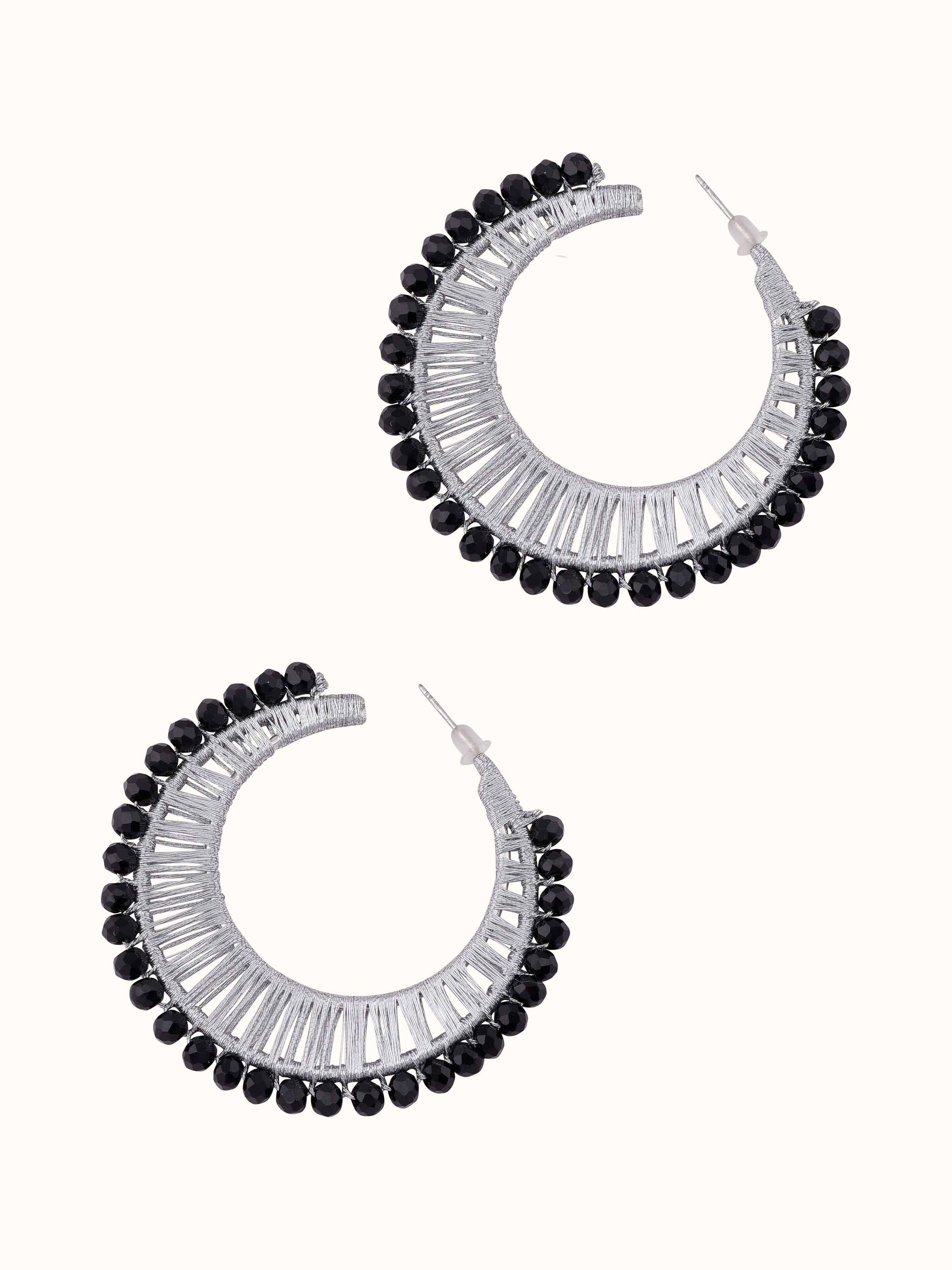 Angled view of Handcrafted Hoop Earrings showcasing the hoop design and overall elegance.