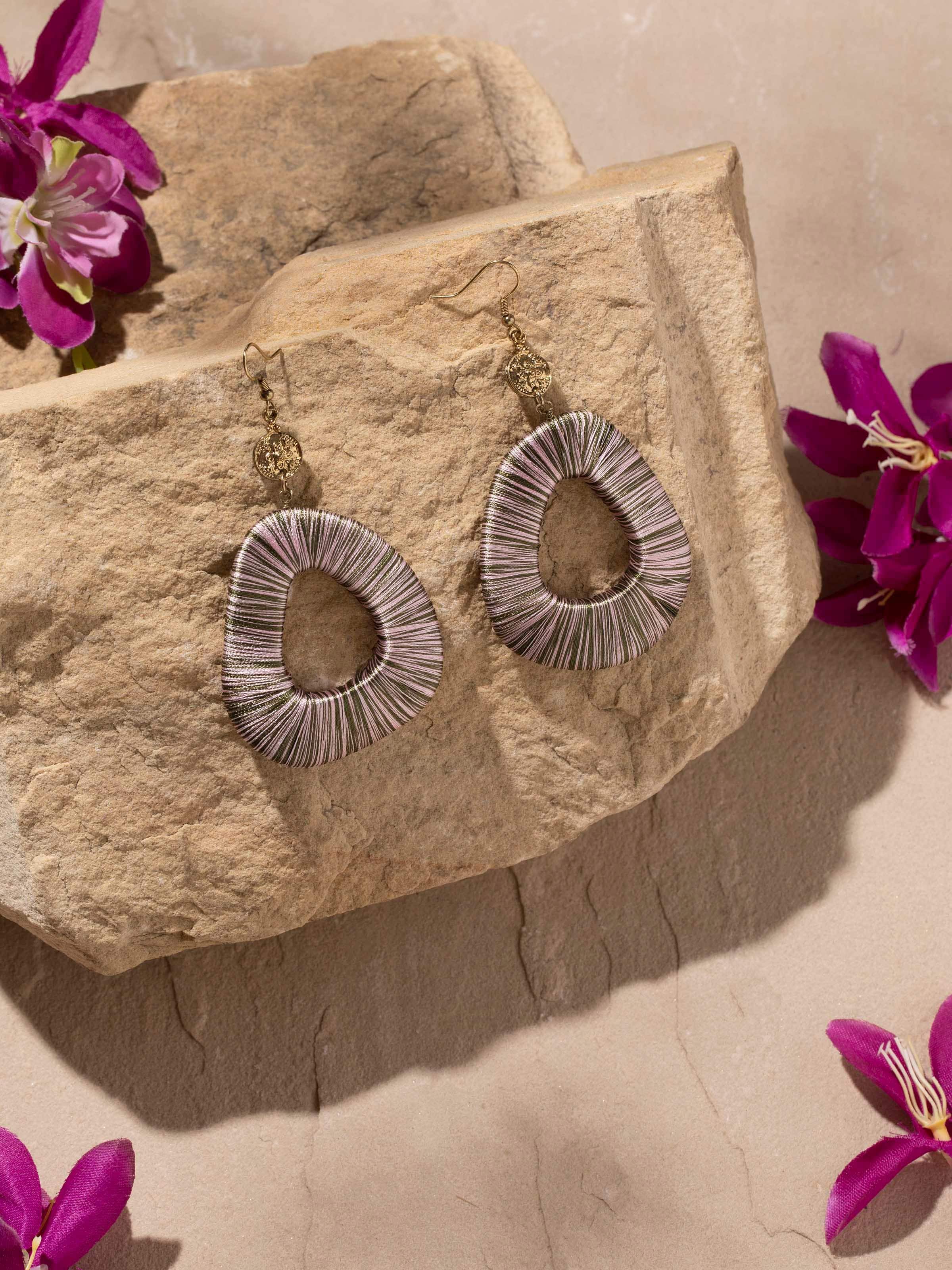 Side view of Handcrafted Drop Earrings emphasizing the drop design and artisanal quality.