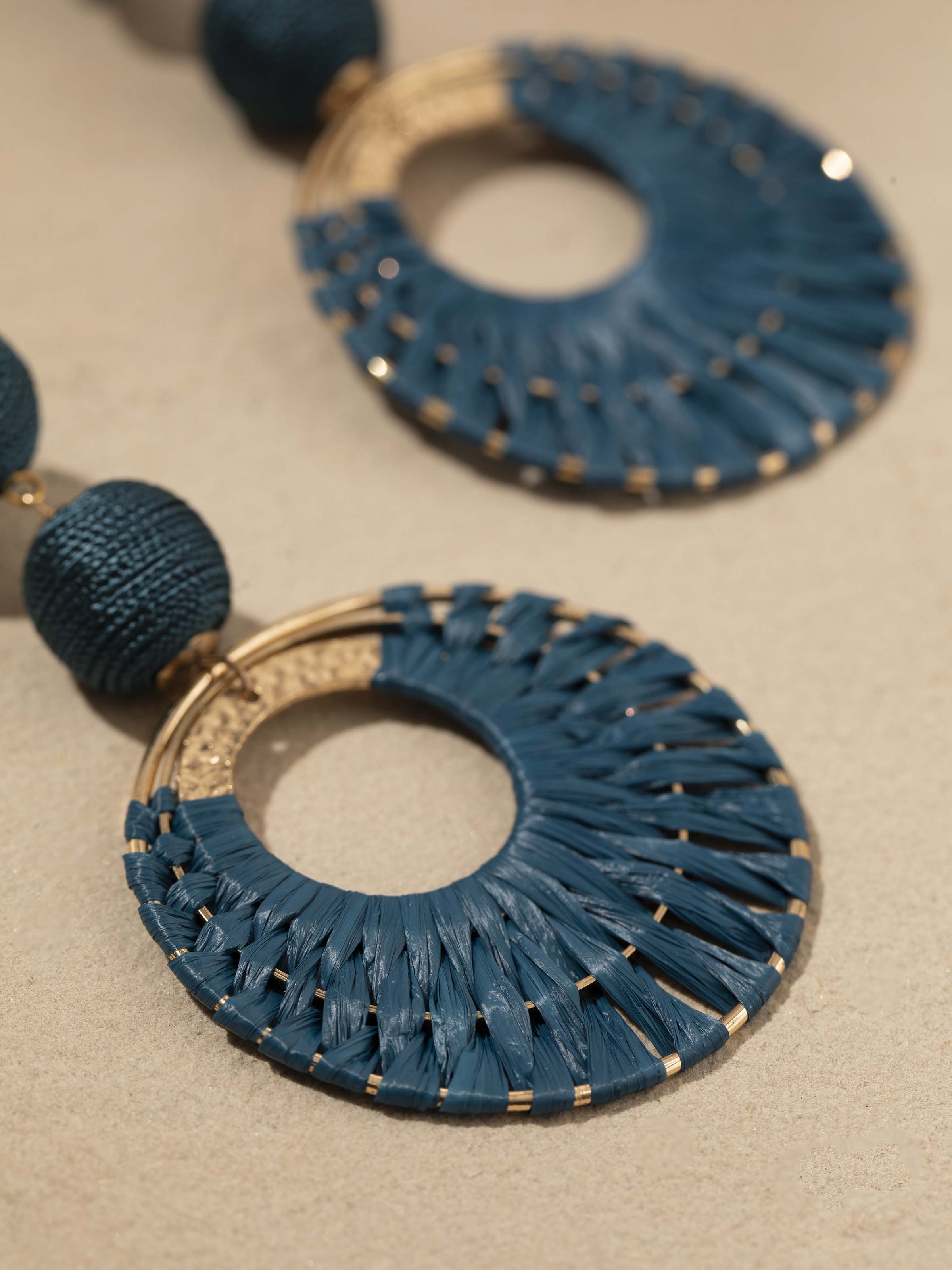 Detailed image of Handcrafted Drop Earrings focusing on the fine craftsmanship and artistic design elements.