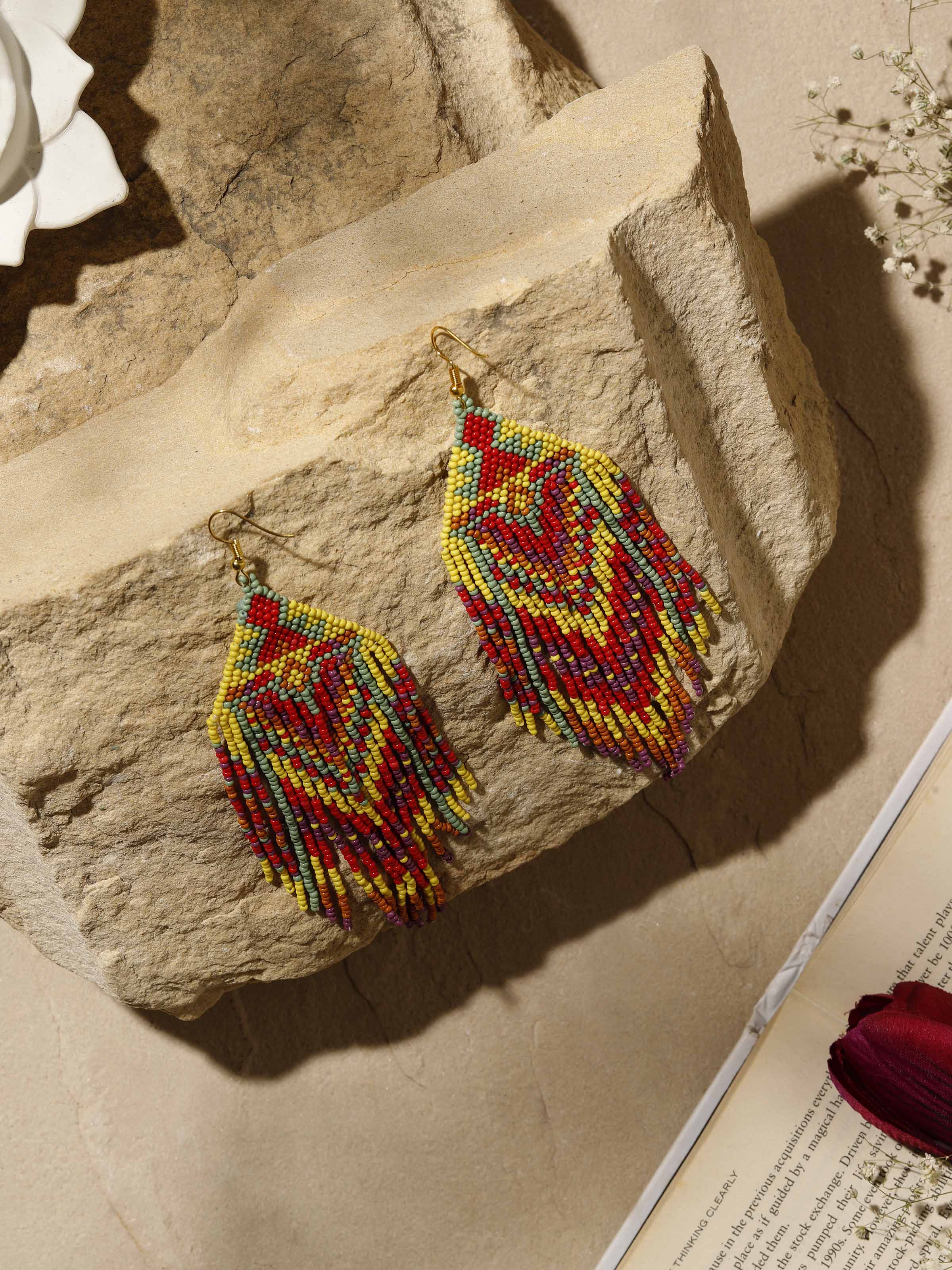 Side view of Handcrafted Drop Earrings highlighting the detailed craftsmanship and elegant drop style.