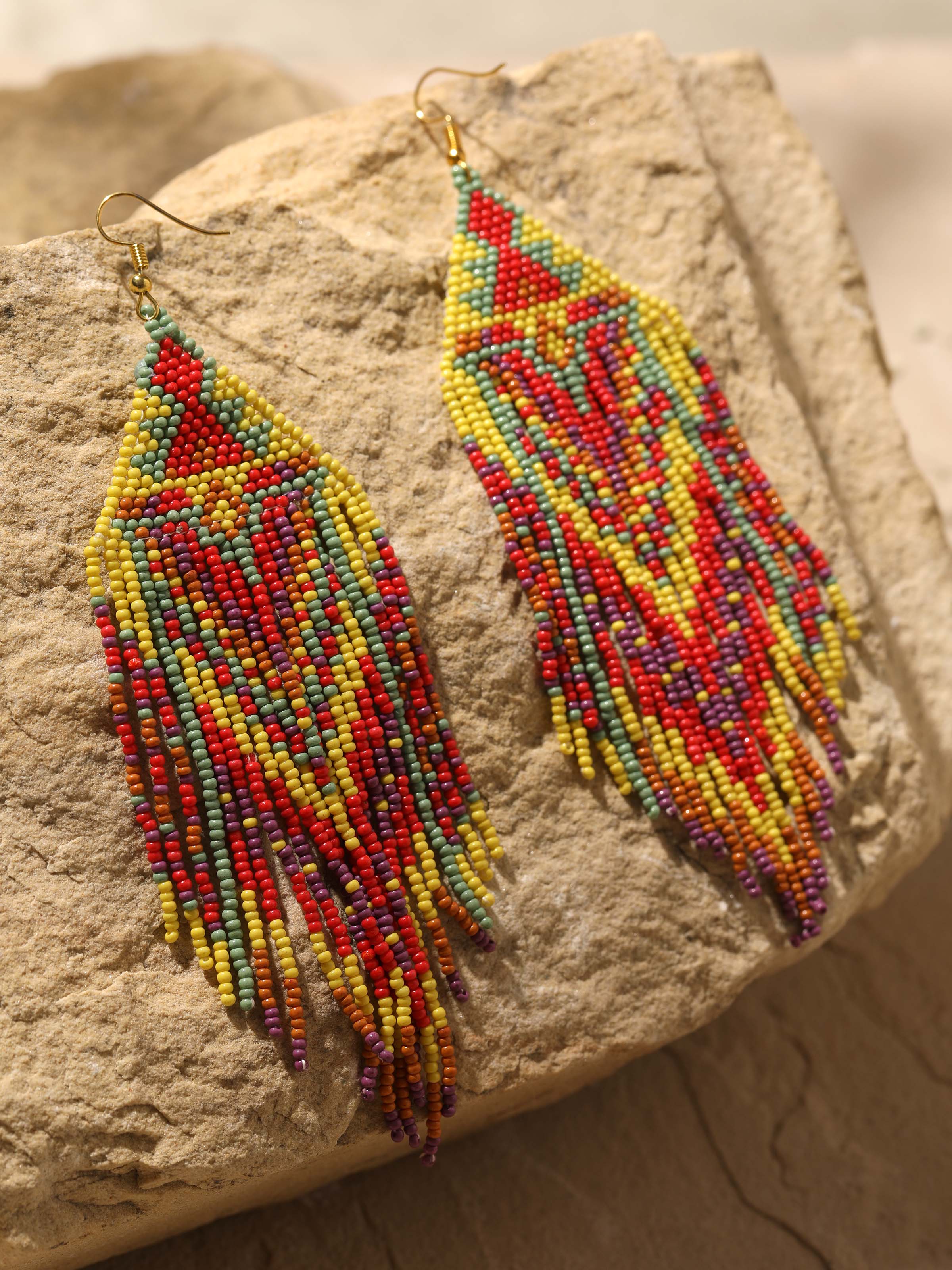 Detailed view of Handcrafted Drop Earrings highlighting their elegant design and artisanal finish.