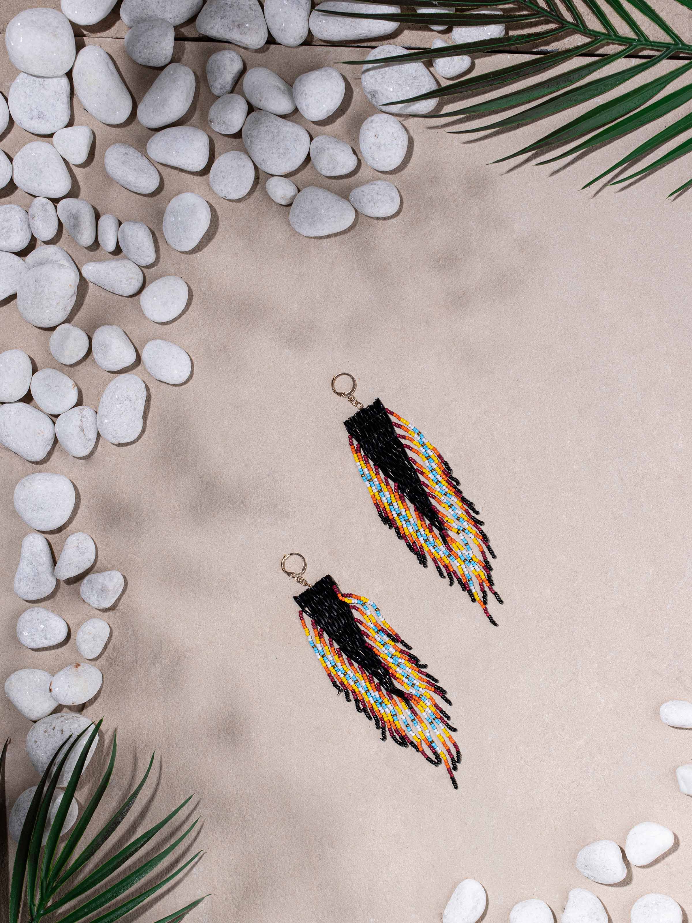 Close-up of Handcrafted Drop Earrings focusing on intricate beadwork and detailing