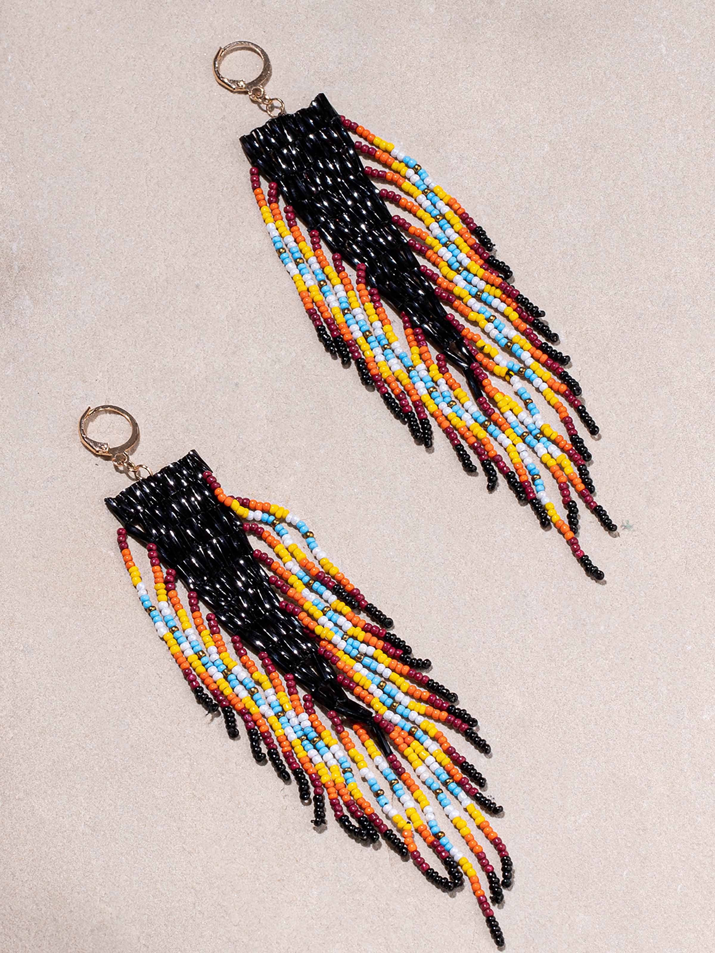 Detailed shot of Handcrafted Drop Earrings focusing on fine craftsmanship and vibrant colors