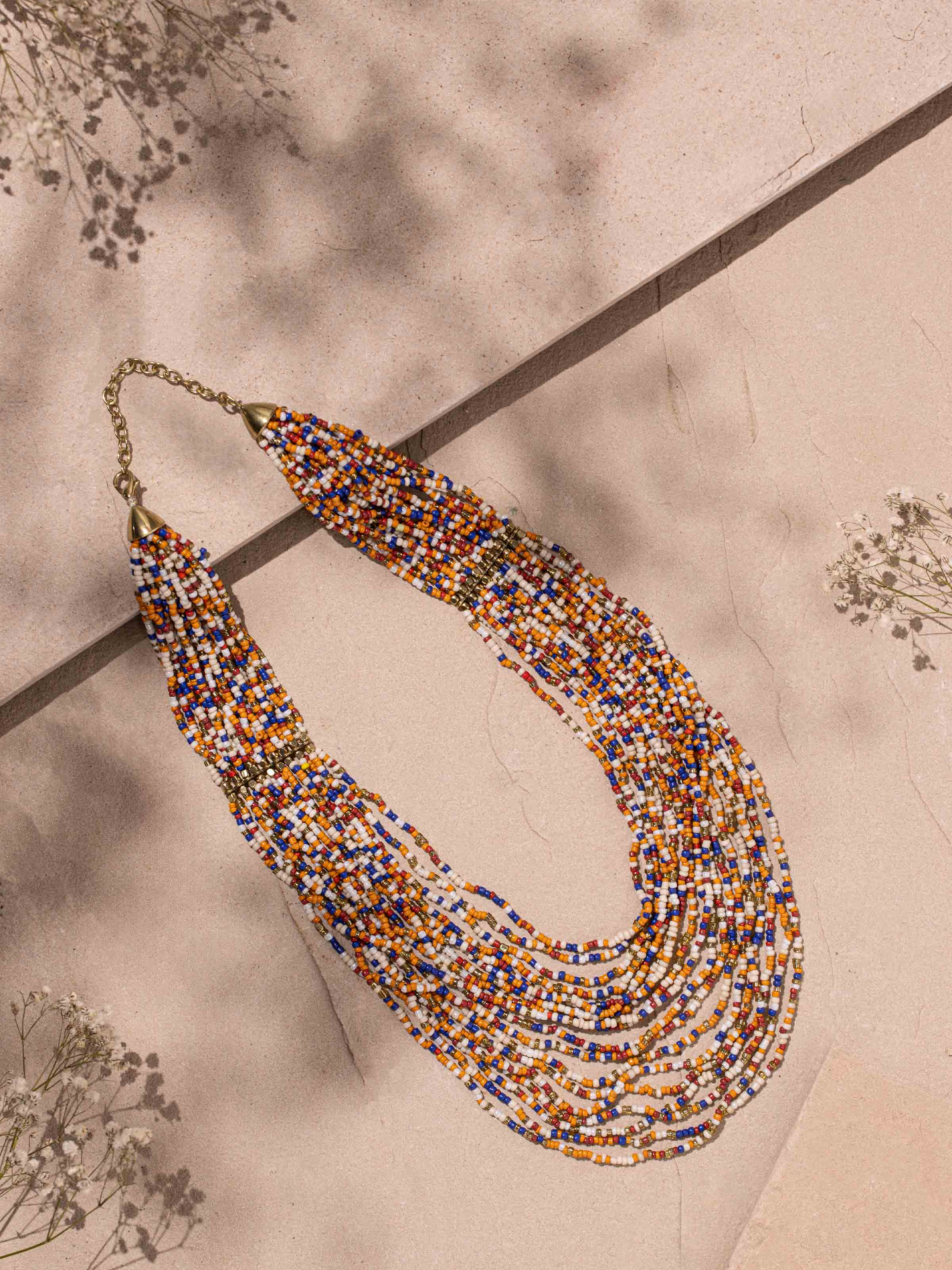Side view of Handcrafted Collar Necklace showcasing its profile and elegant design.
