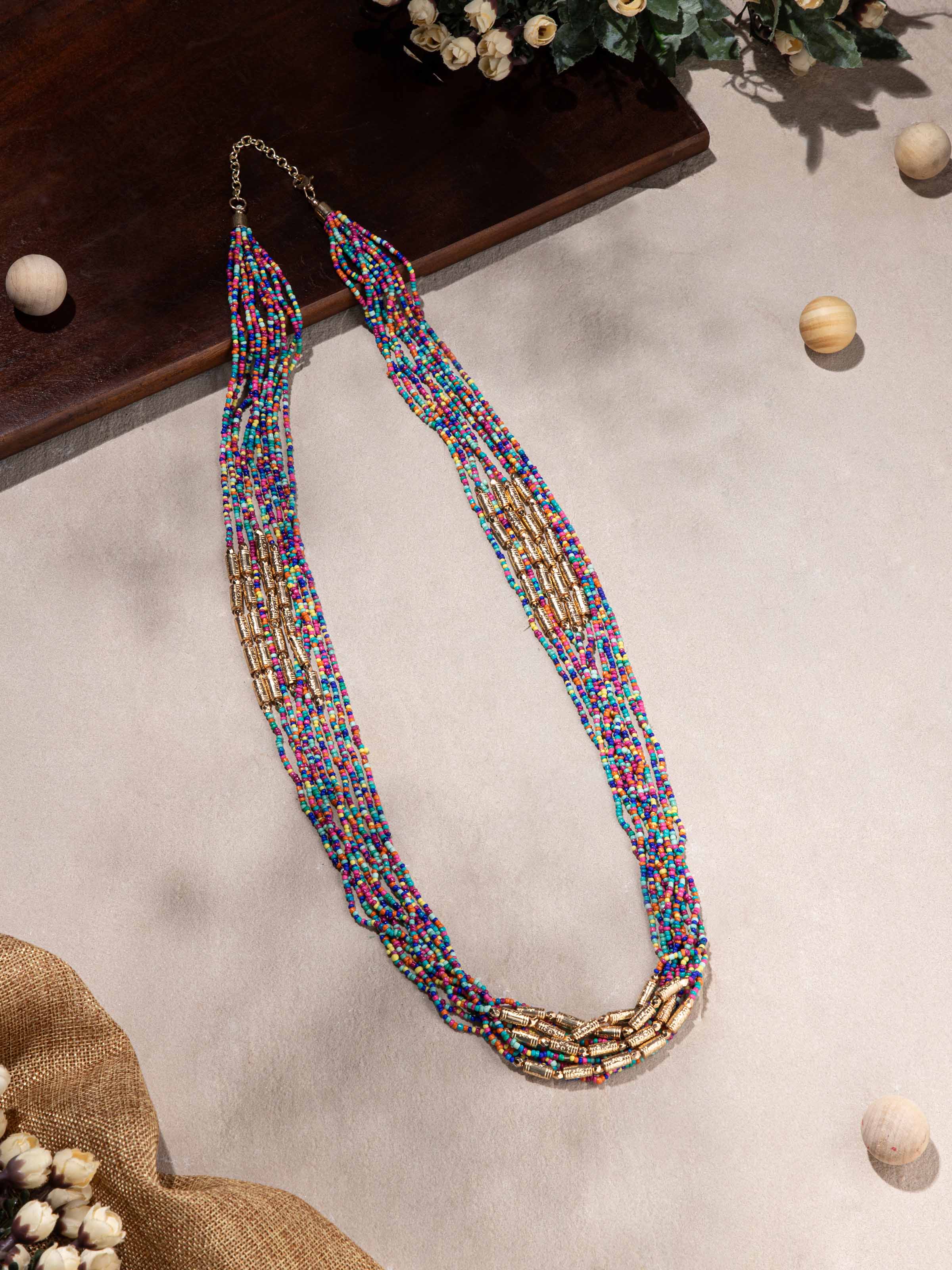 Close-up of handcrafted collar necklace showing intricate design elements