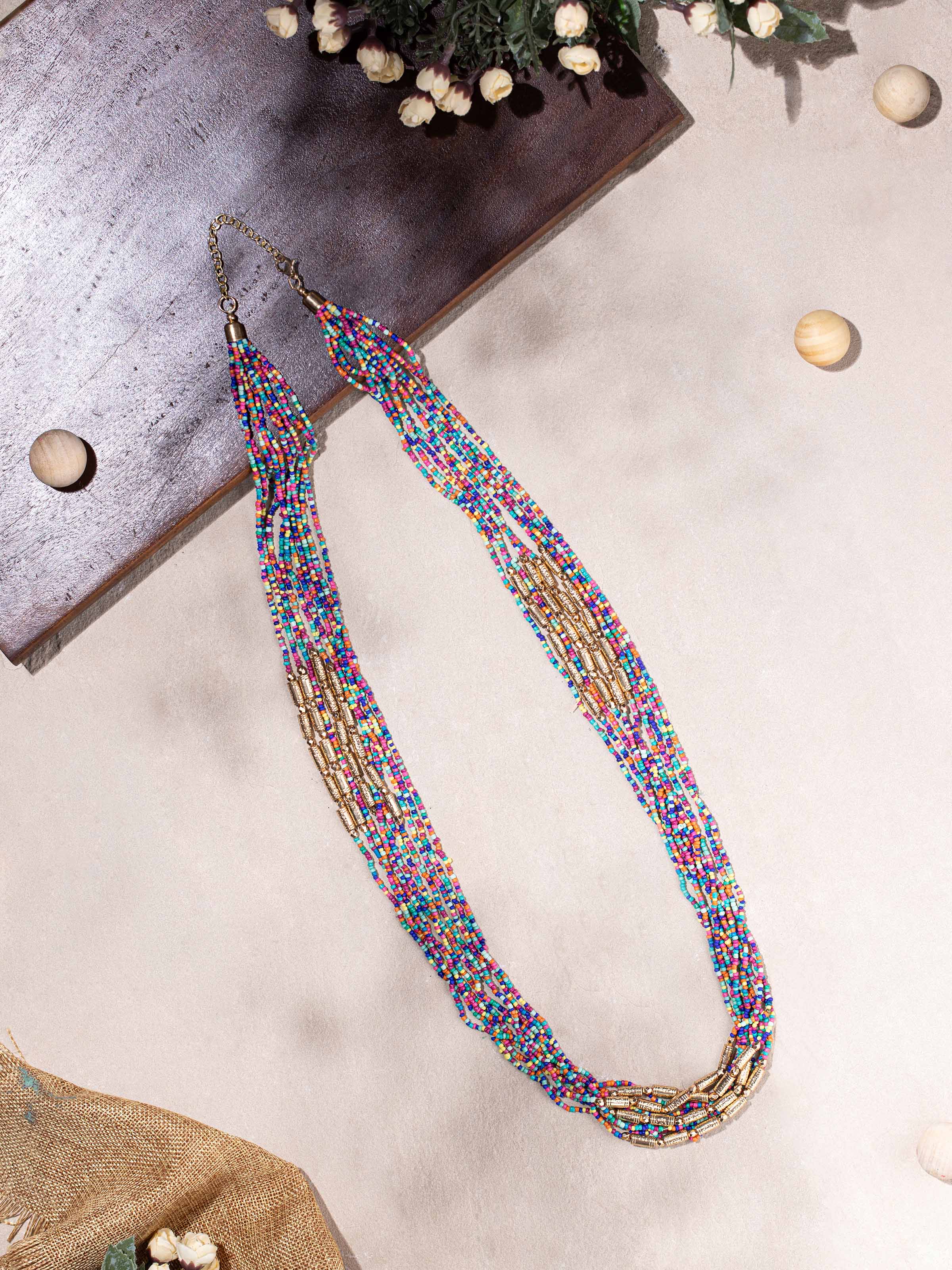 Detailed front view of handcrafted collar necklace with ornate design