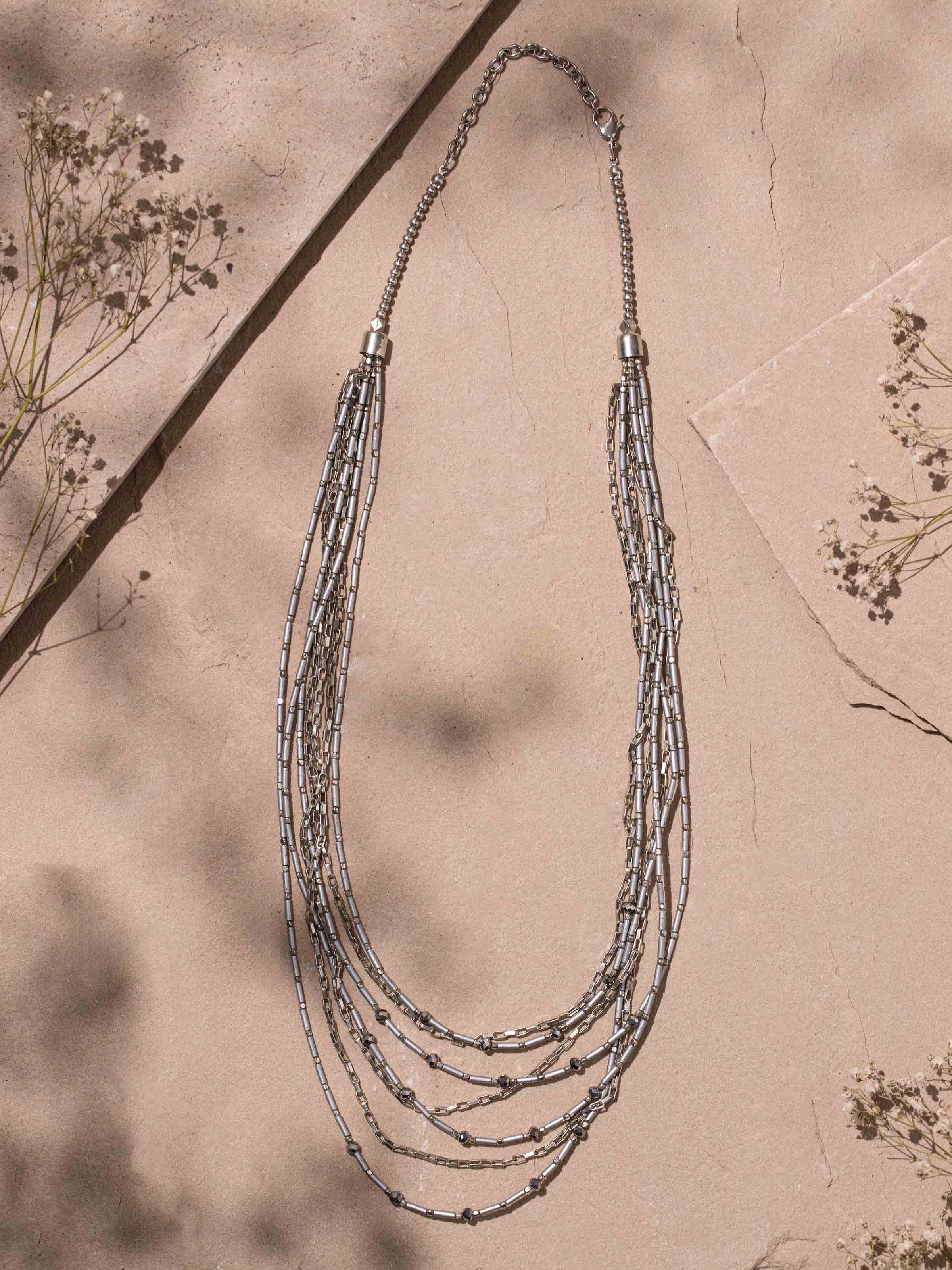 Close-up view of handcrafted collar necklace showcasing intricate design details and craftsmanship