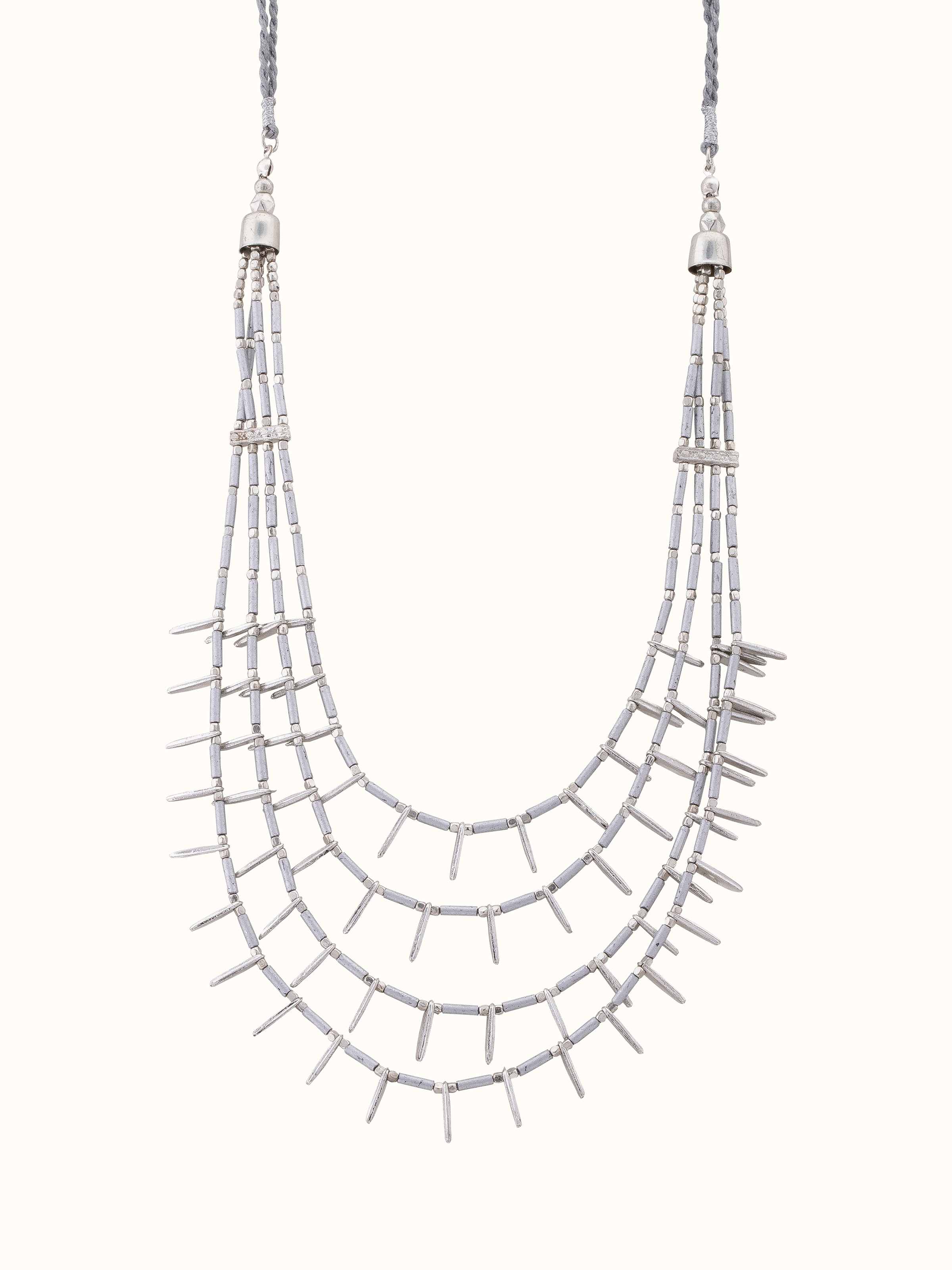 Front view of handcrafted collar necklace highlighting its intricate design and elegant craftsmanship.