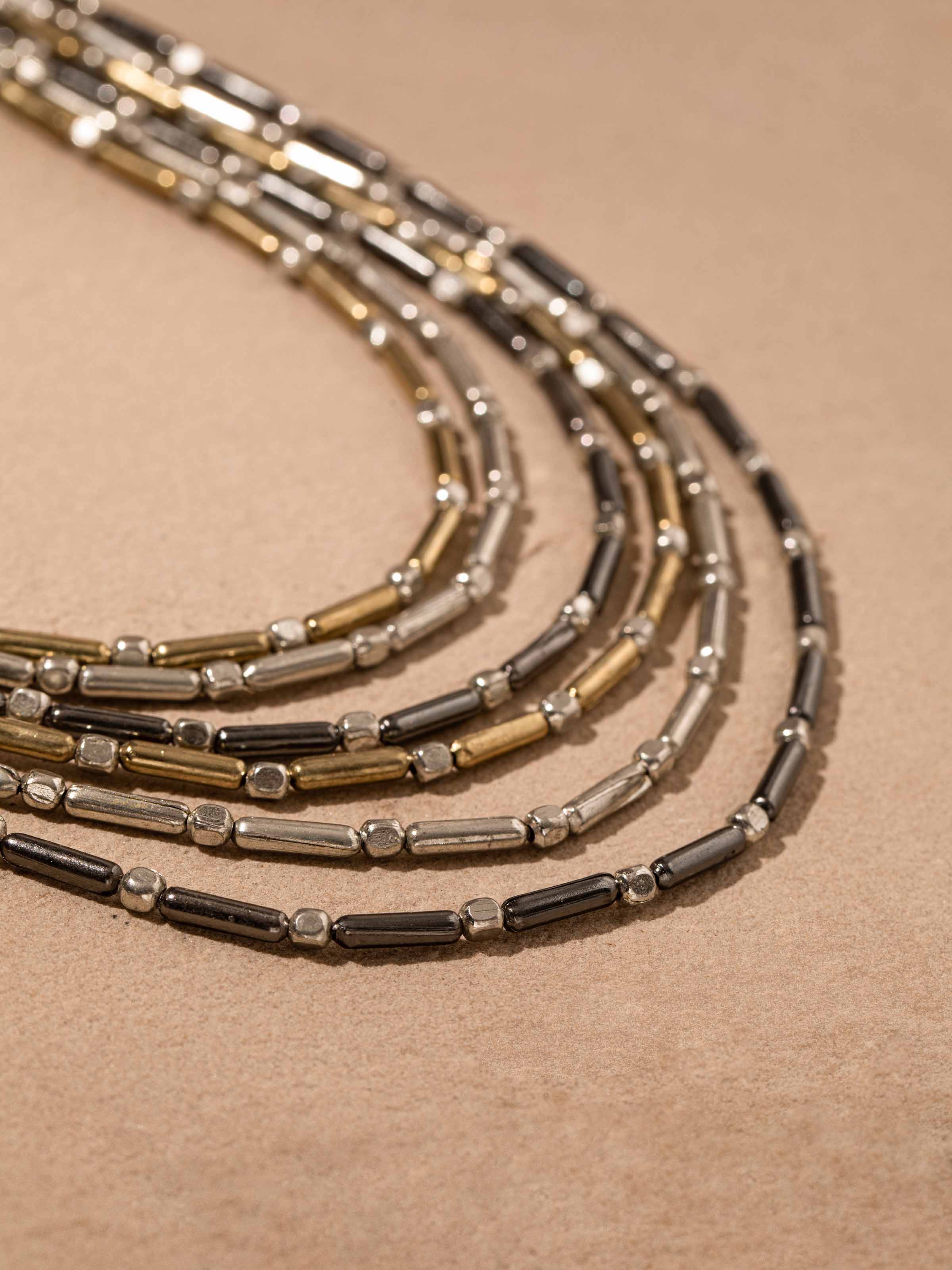 Detailed front view of handcrafted collar necklace highlighting its unique and artistic design