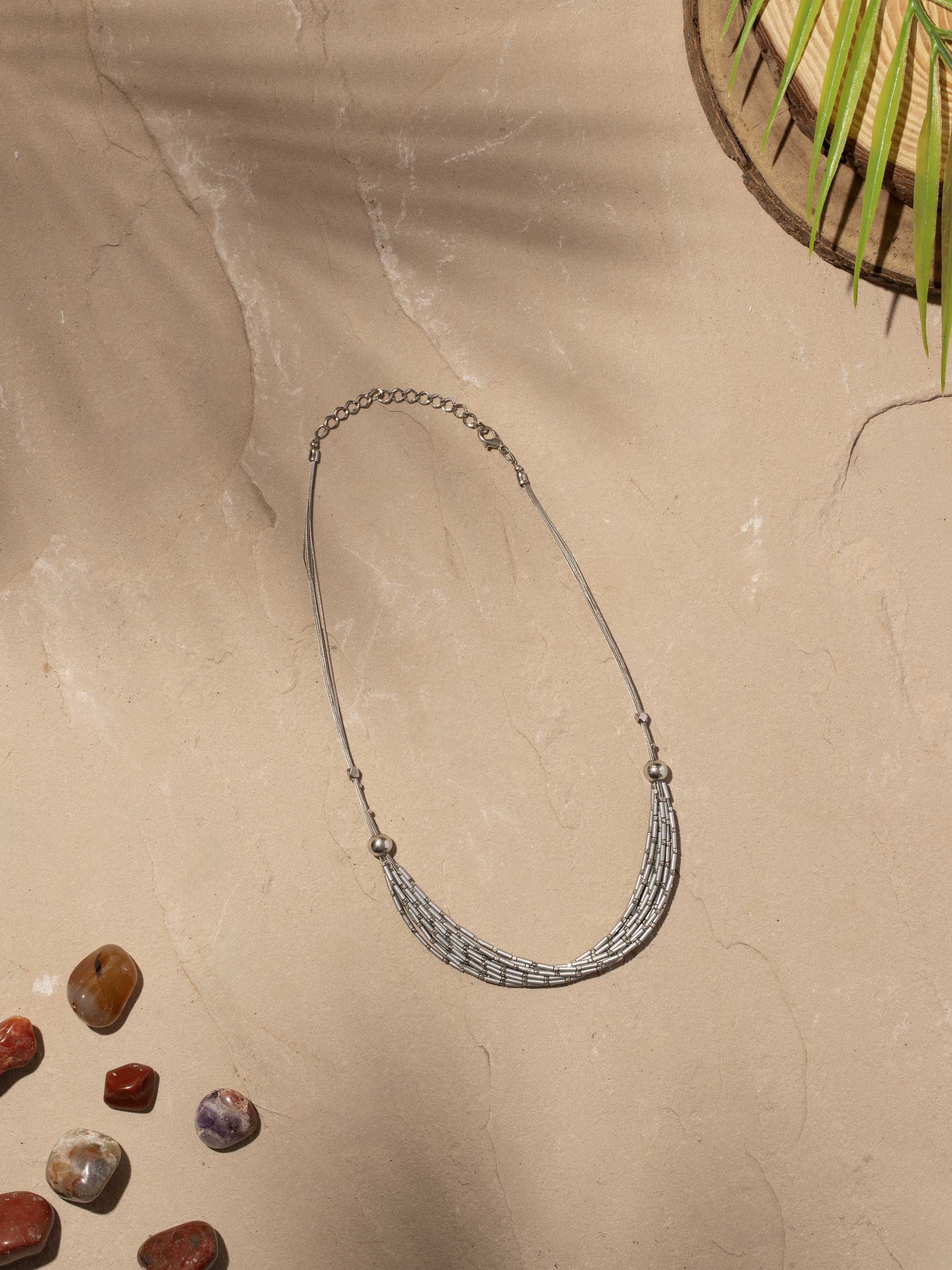 Side view of Handcrafted Collar Necklace showcasing its elegant design.