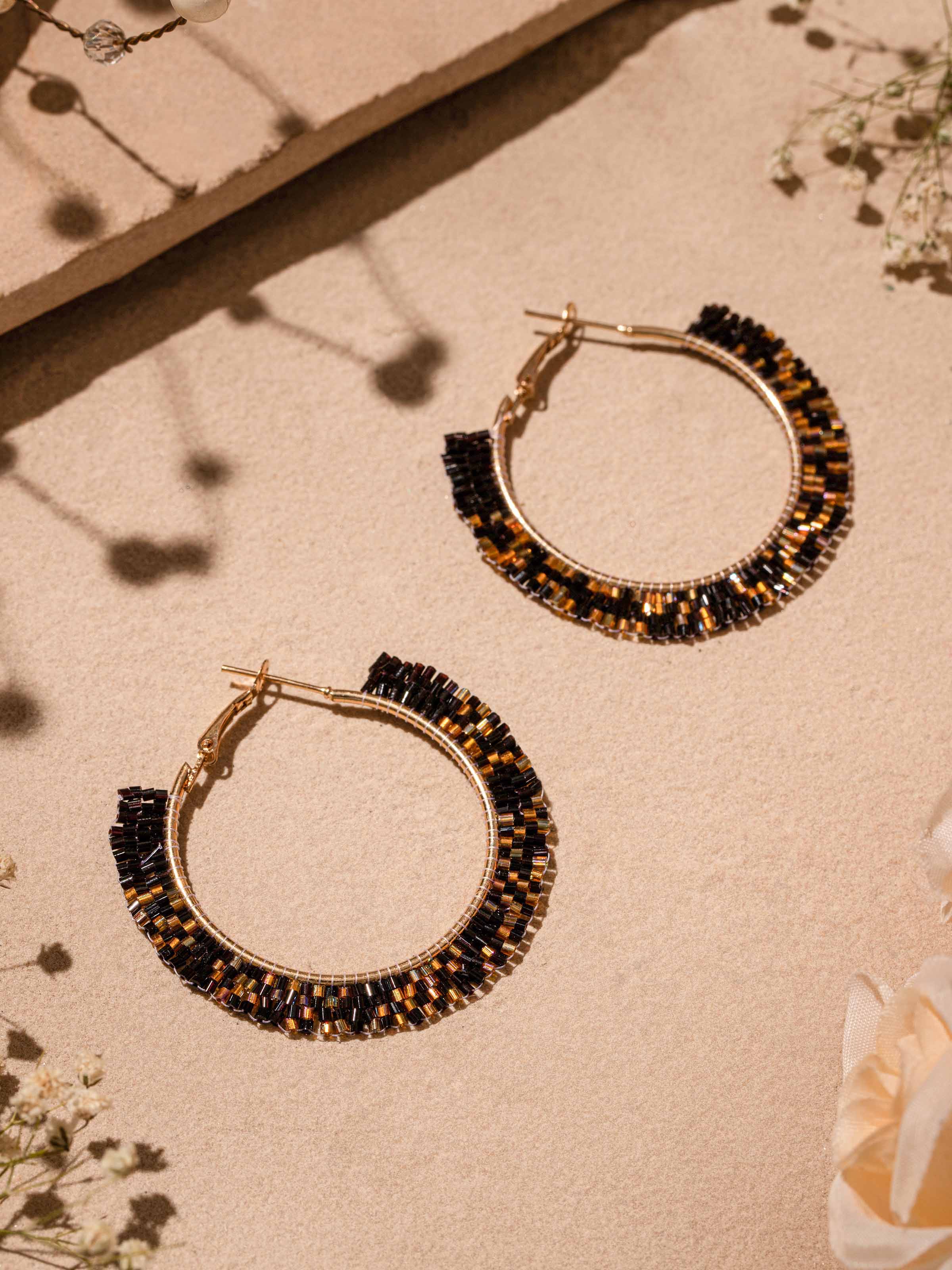 Close-up of Handcrafted Hoop Earrings highlighting detailed craftsmanship and design.