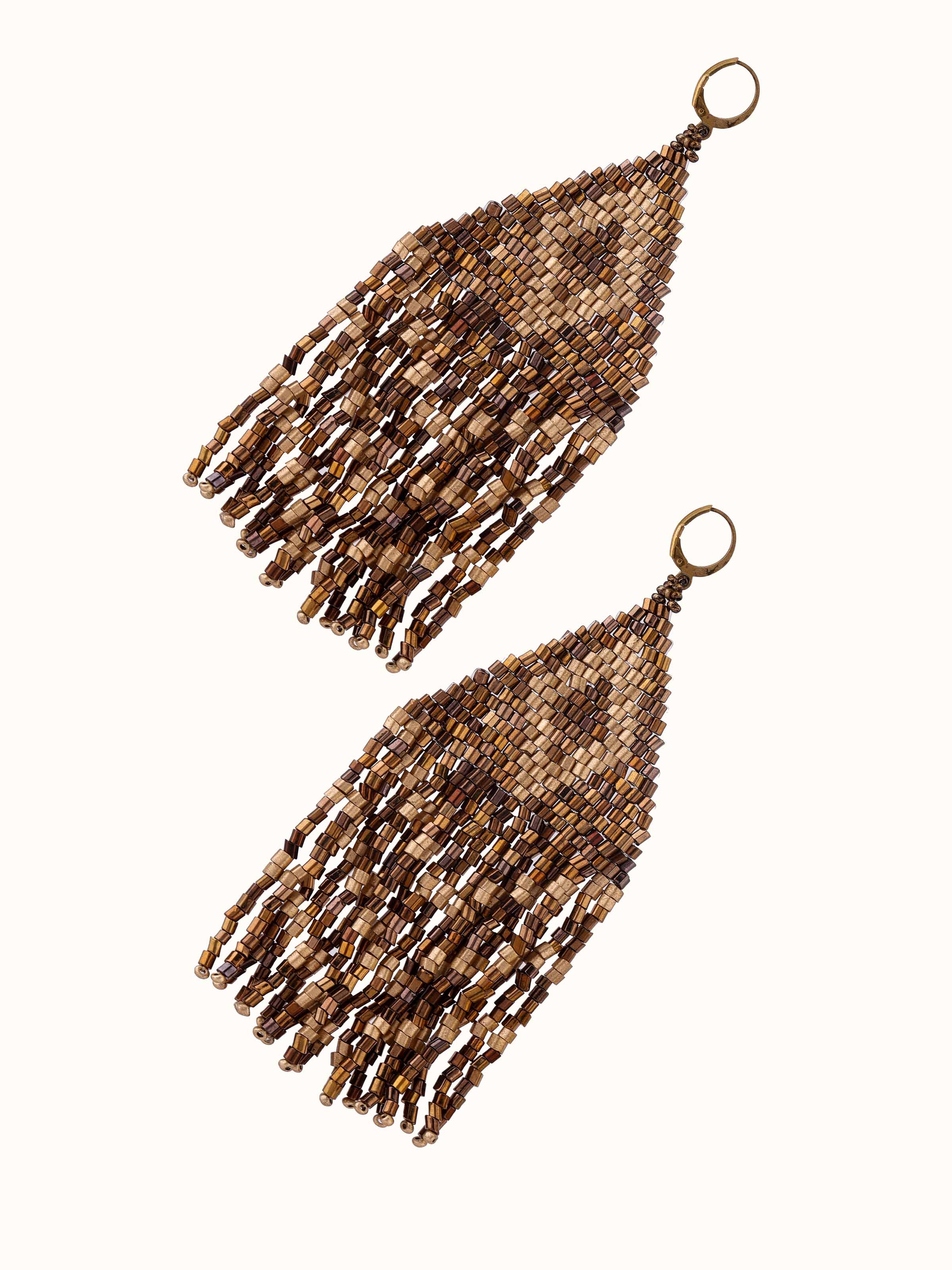 Angled view of Handcrafted Drop Earrings emphasizing their sophisticated look.