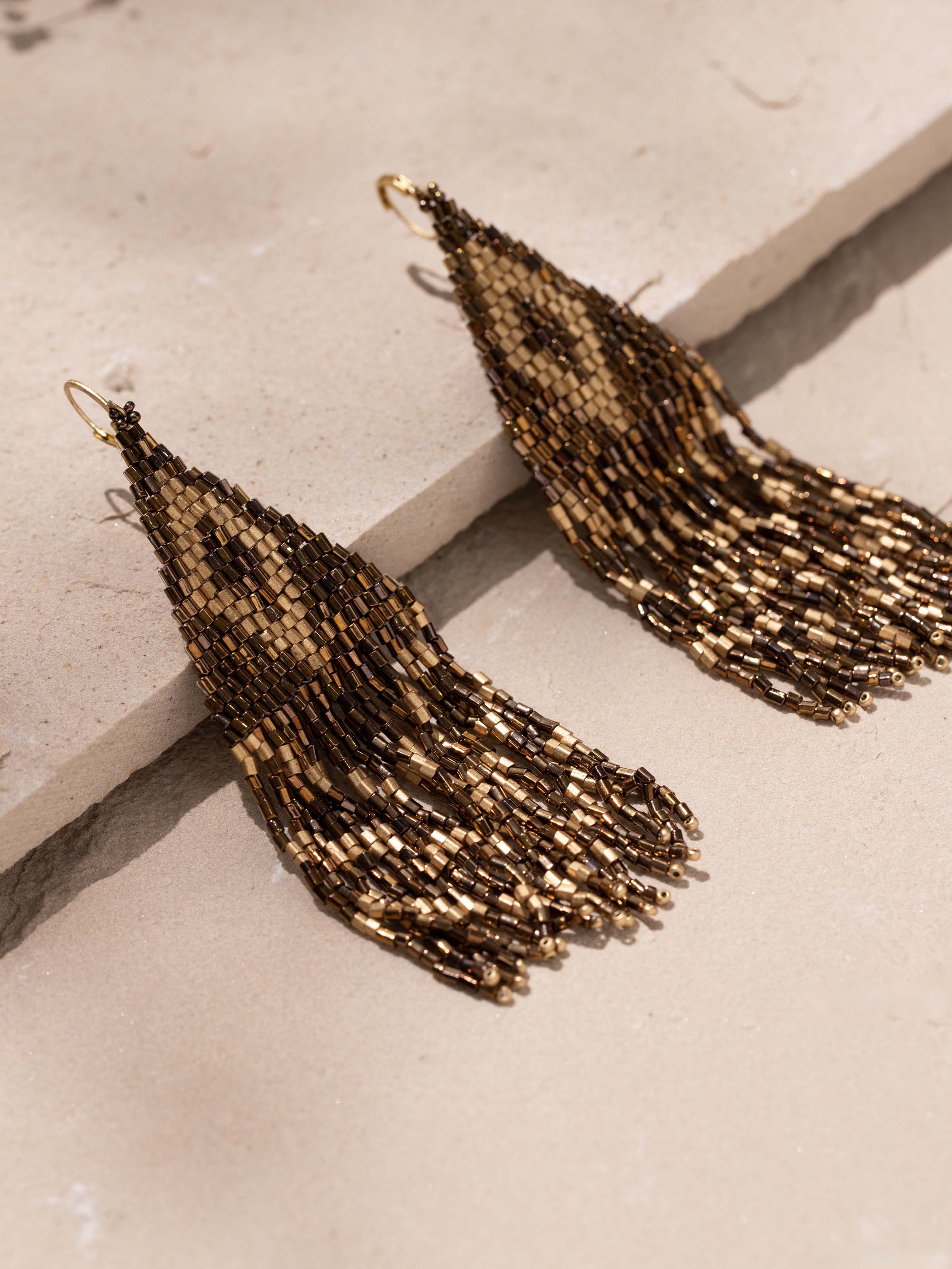 Back view of Handcrafted Drop Earrings showcasing hook and design details.
