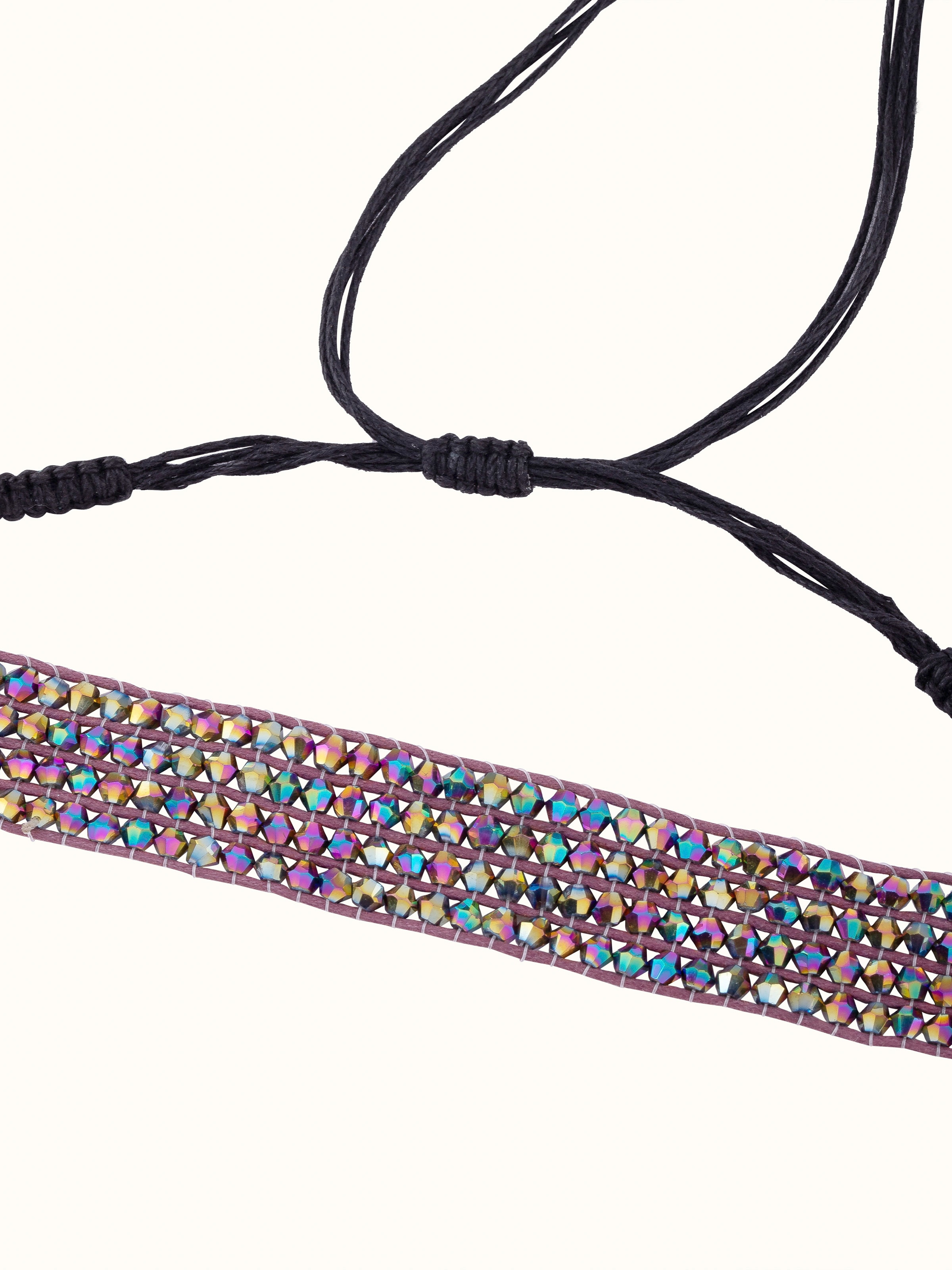 Overhead view of handcrafted choker emphasizing colorful design and craftsmanship