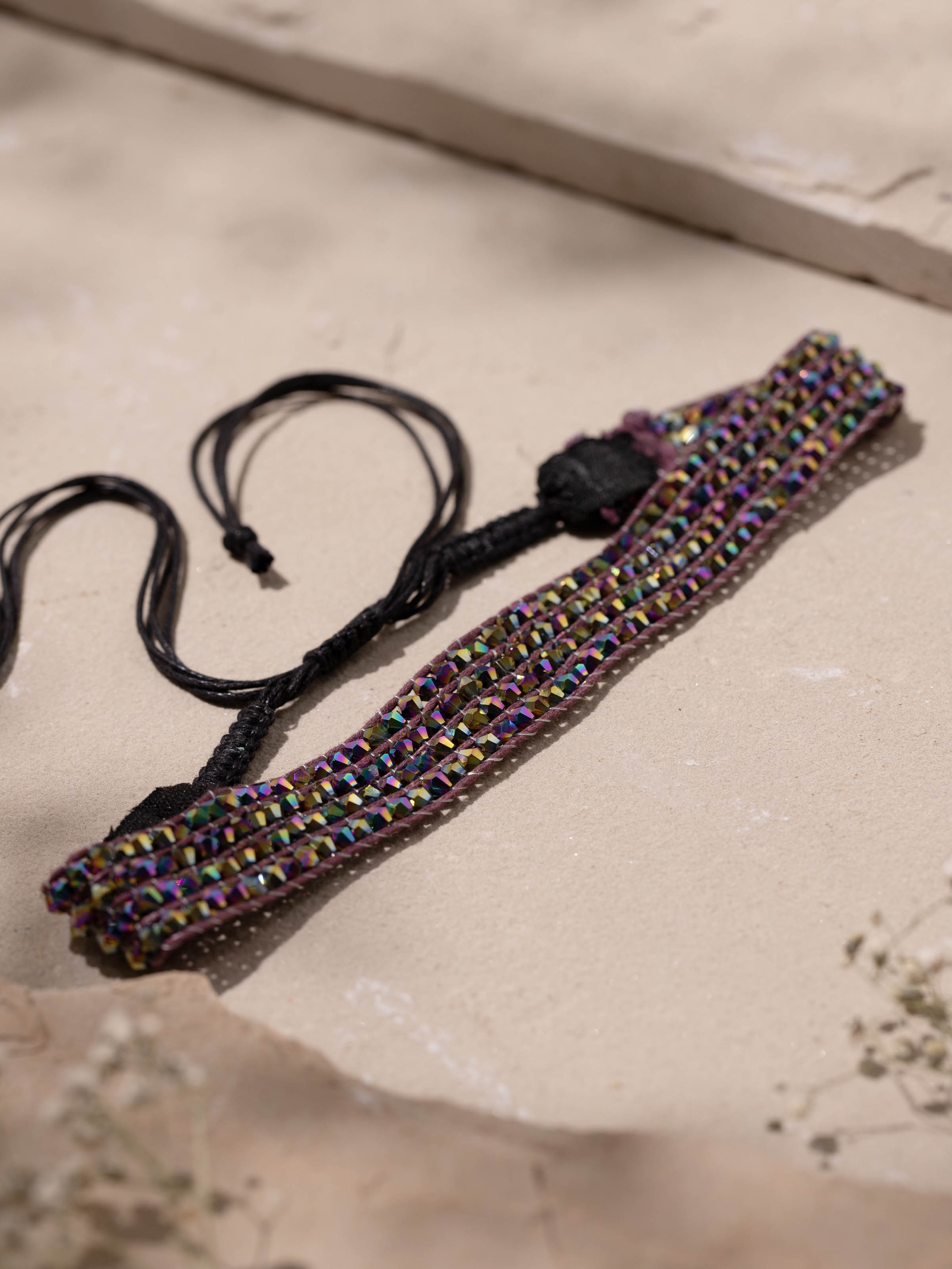 Detailed shot of handcrafted choker focusing on its unique and elegant design