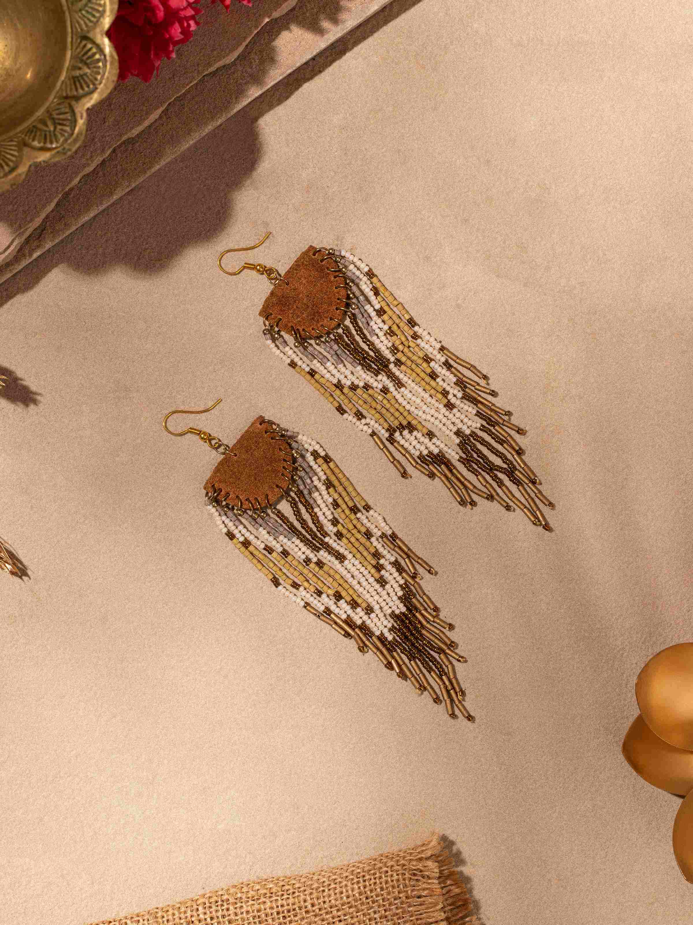 Close-up of Handcrafted Drop Earrings showcasing the intricate detailing and unique design elements.