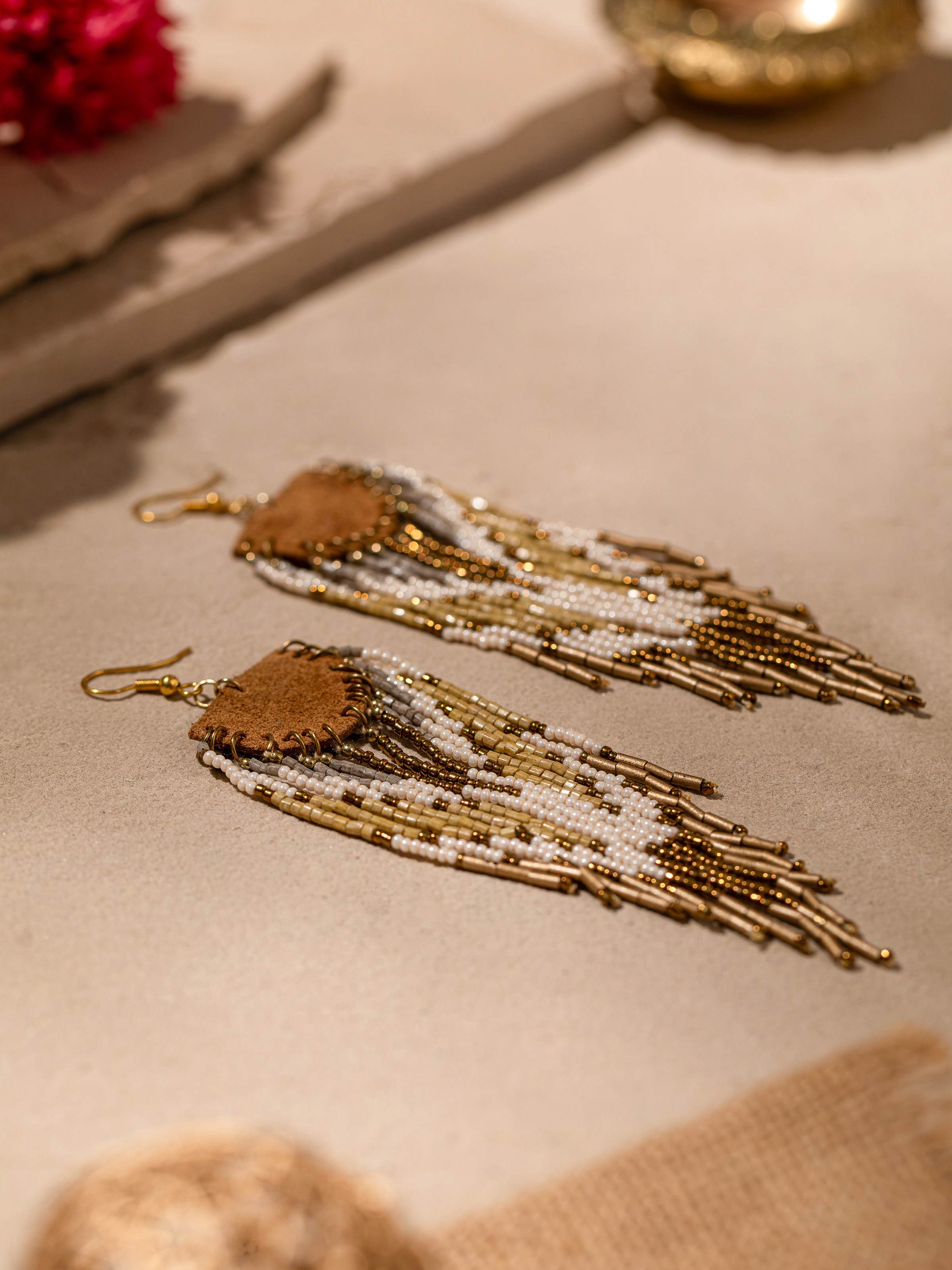 Detailed image of Handcrafted Drop Earrings focusing on the fine craftsmanship and unique design features.