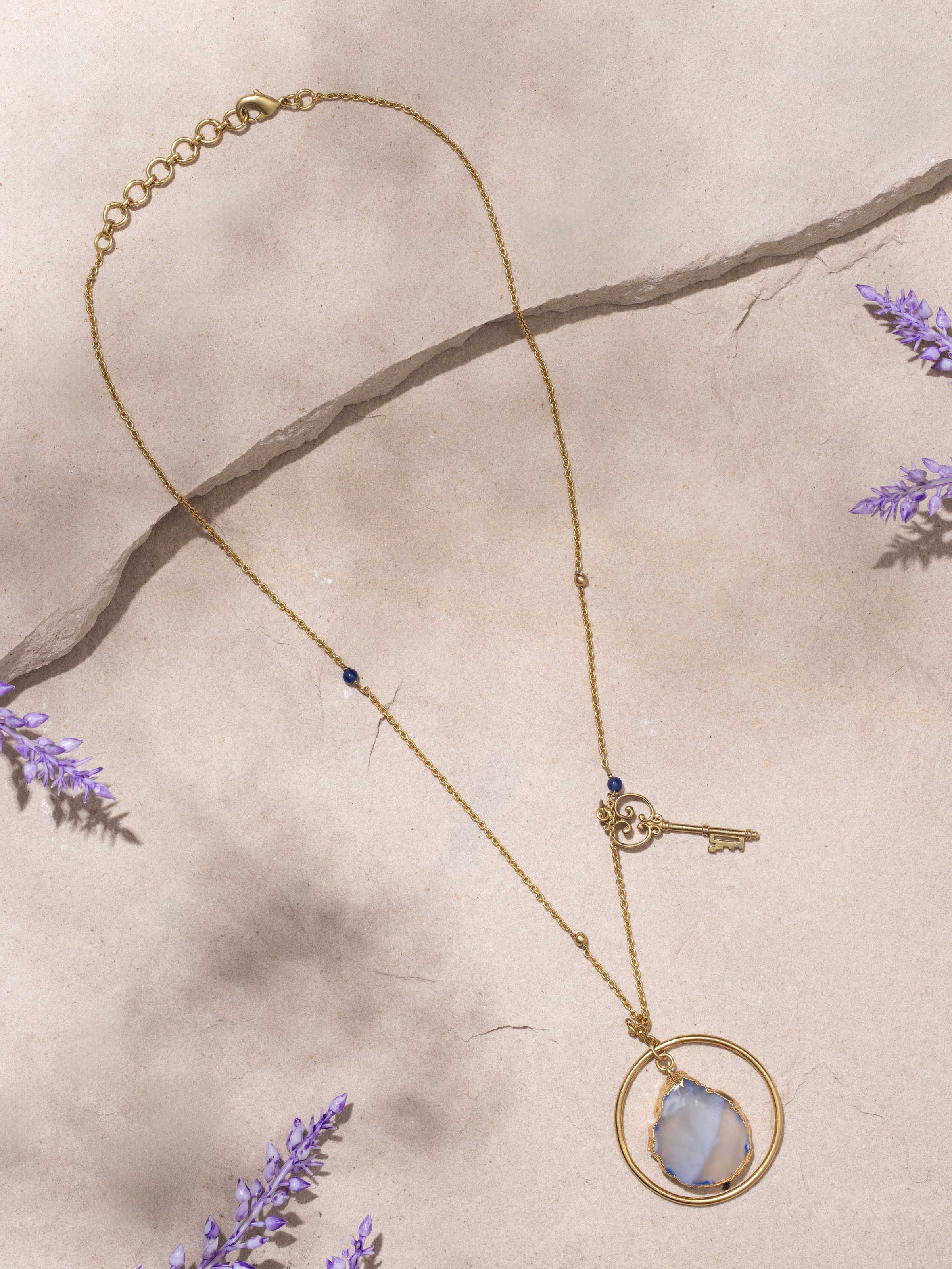 Close-up view of Agate Pendant with Chain showcasing the unique patterns of the agate stone and fine craftsmanship.