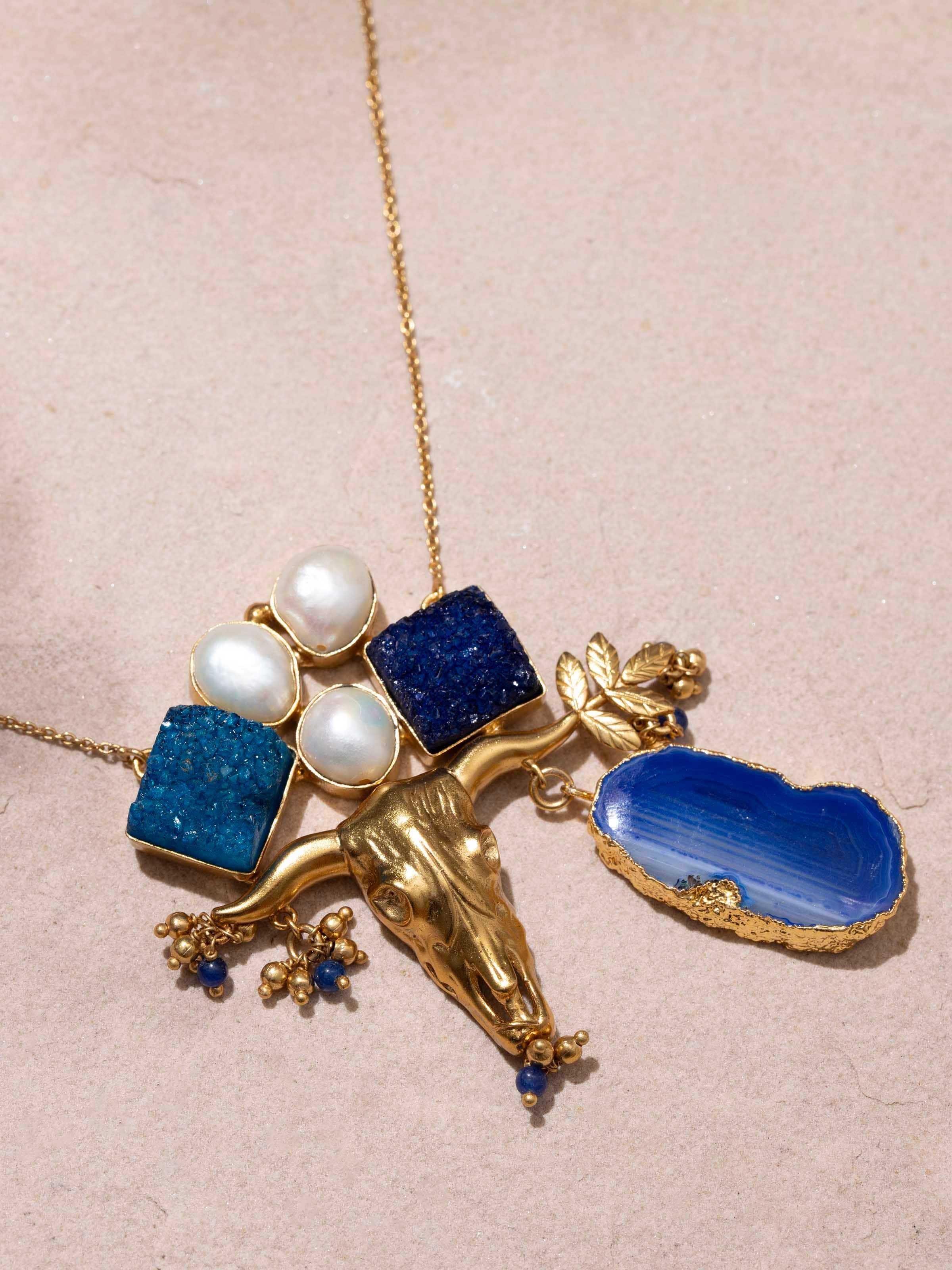 Overhead view of agate long necklace displaying its full length and overall design.