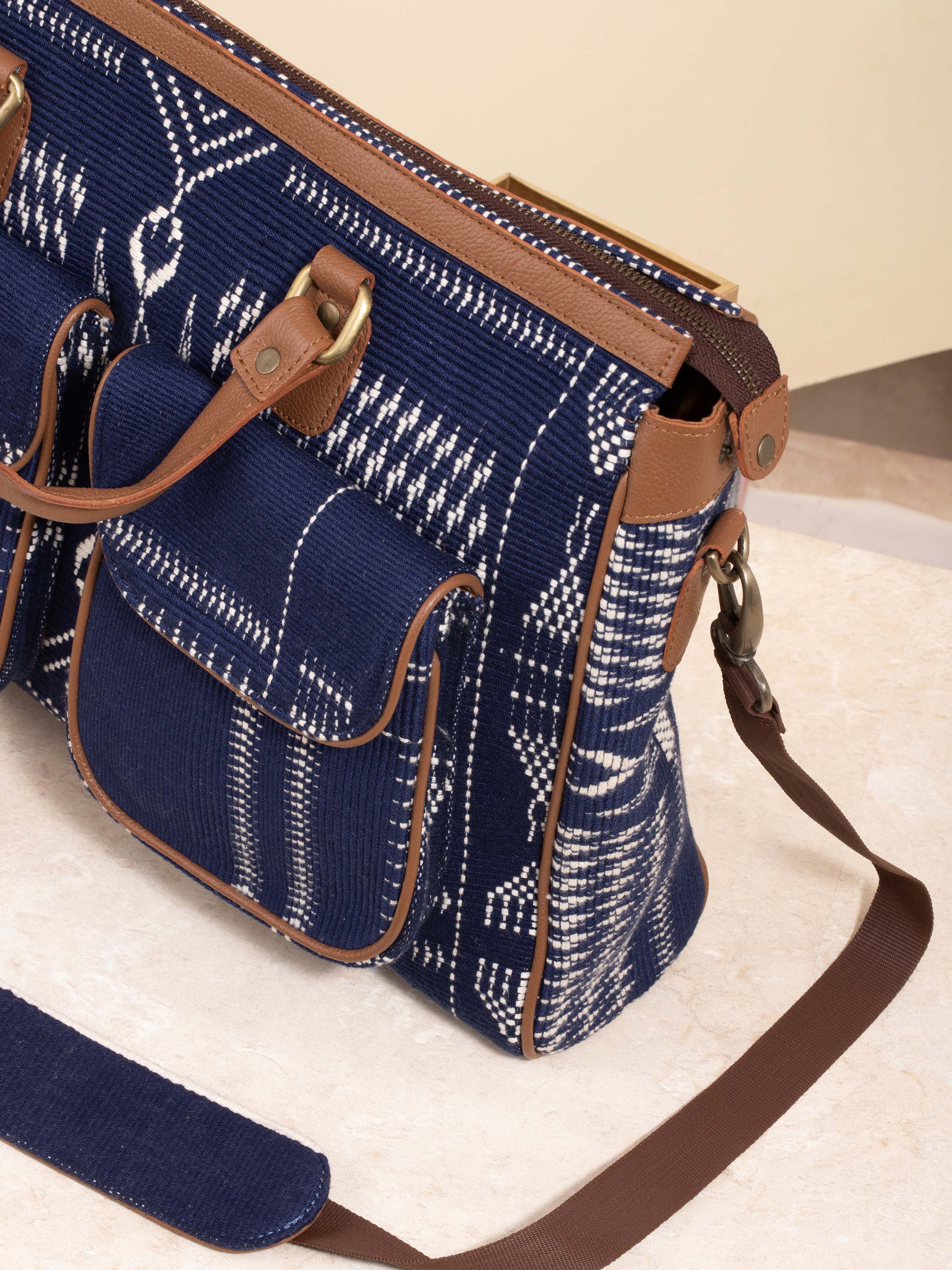 Side view of leather and textile Nagaland business bag highlighting design