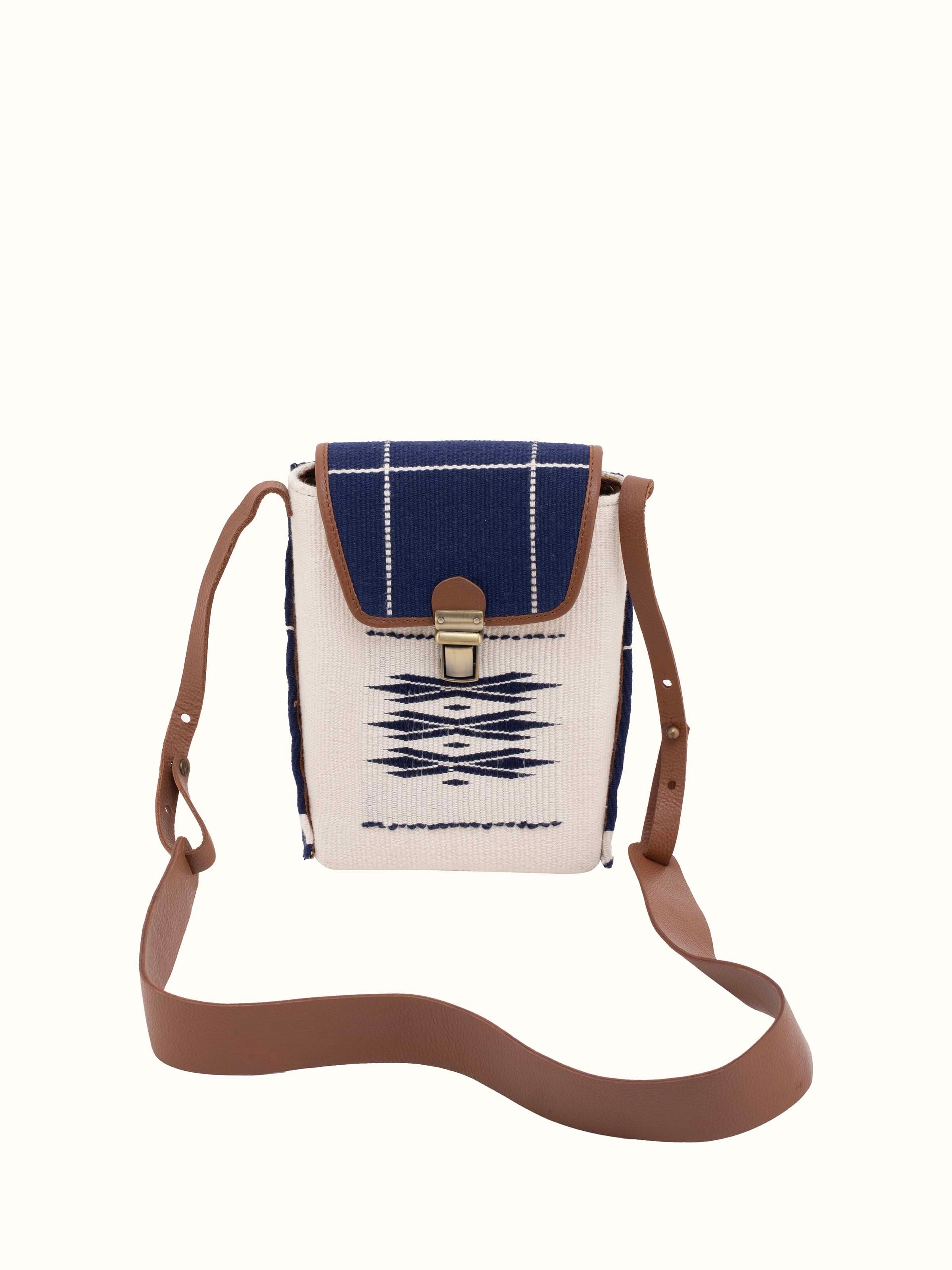 Front view of leather & textile Nagaland loin loom sling bag showcasing intricate design