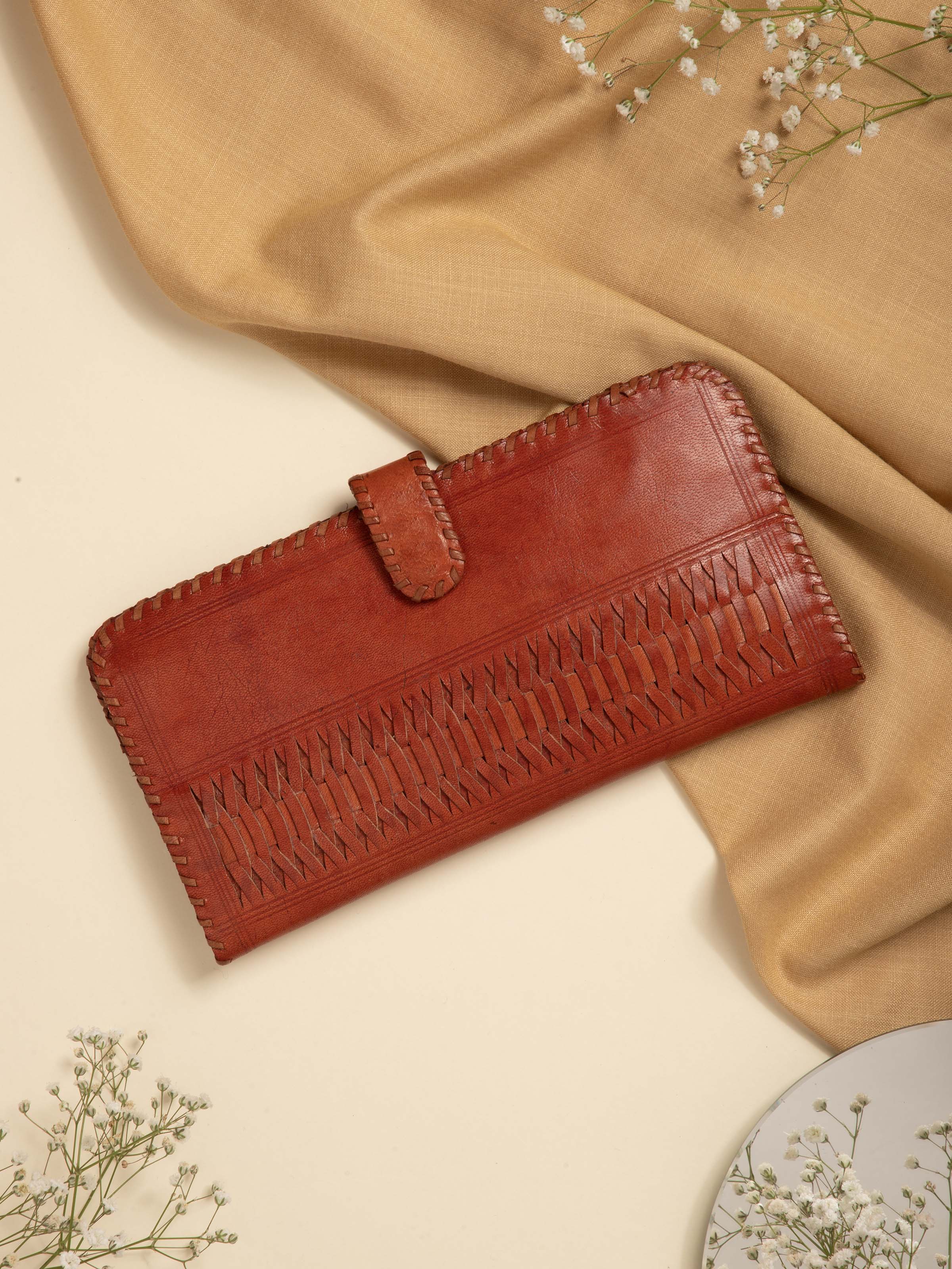 Side view of Tan Leather Kutch Stitched Long Wallet displaying stitching details and clasp.