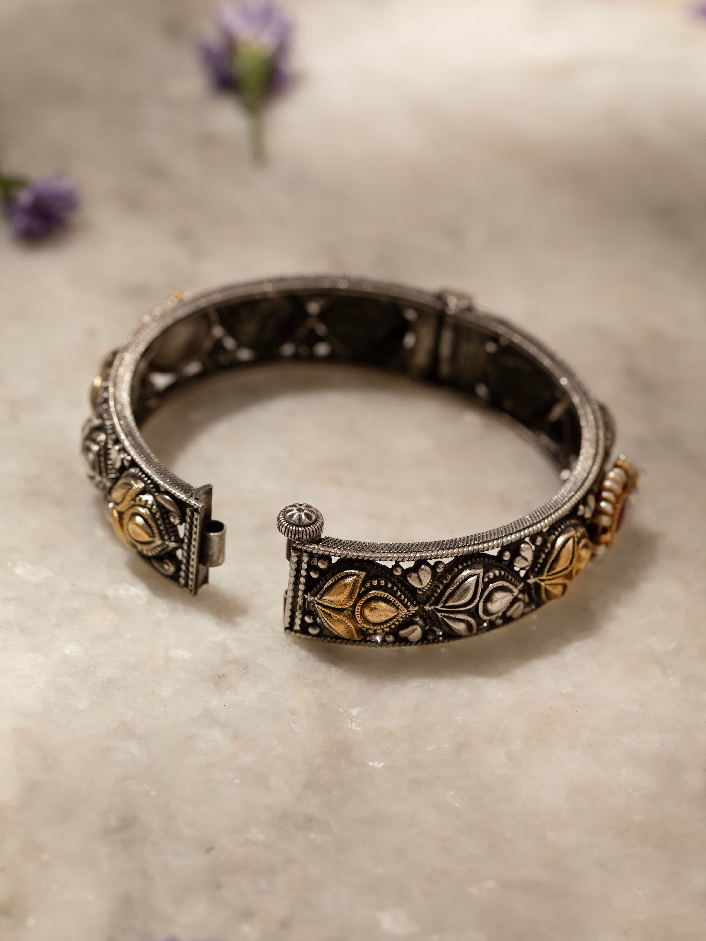 Detailed image of Silver Smithing Bangle emphasizing the high-quality silver craftsmanship and design details.