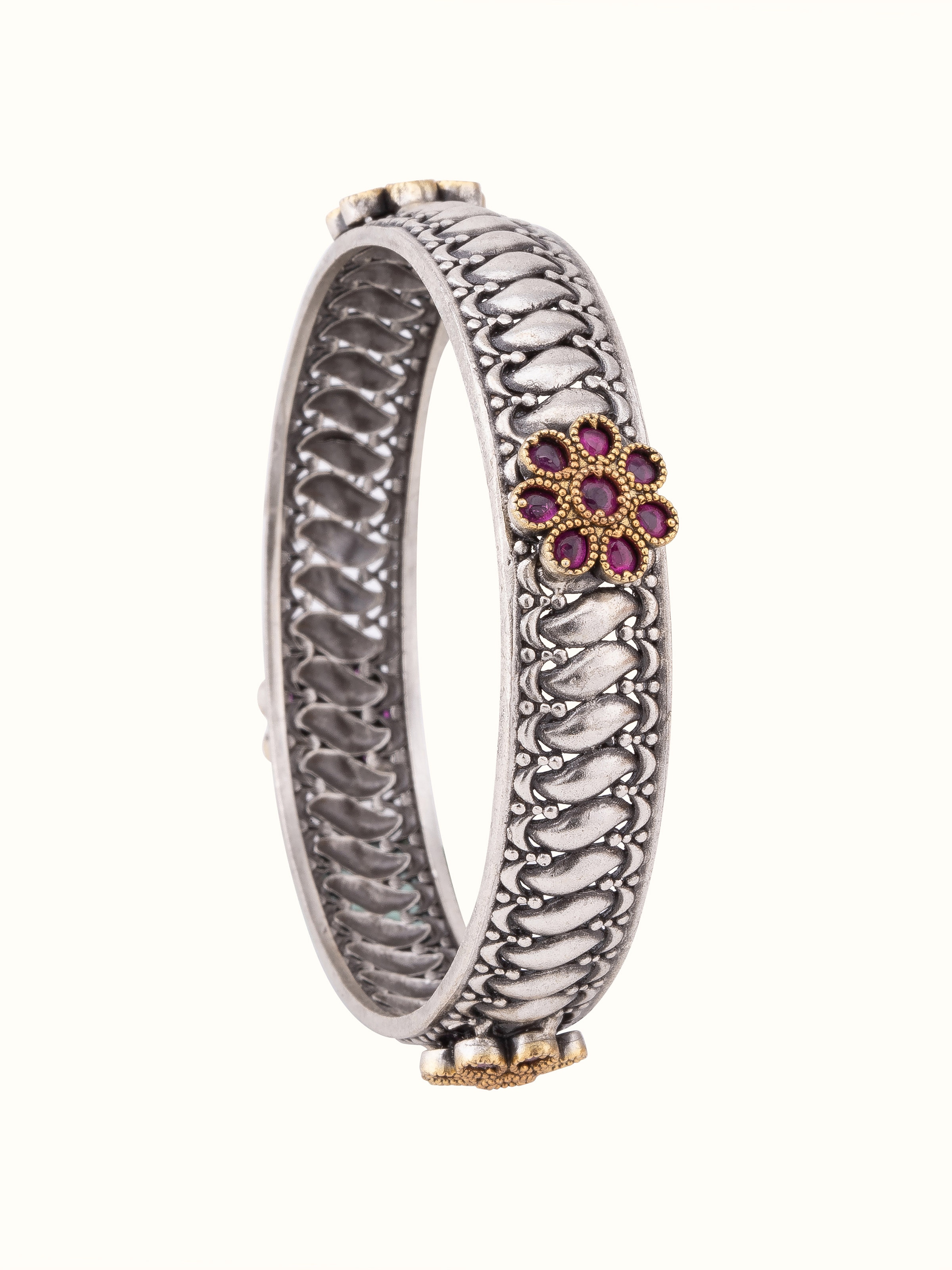 Front view of Silver Smithing bangle showcasing polished metalwork and refined design