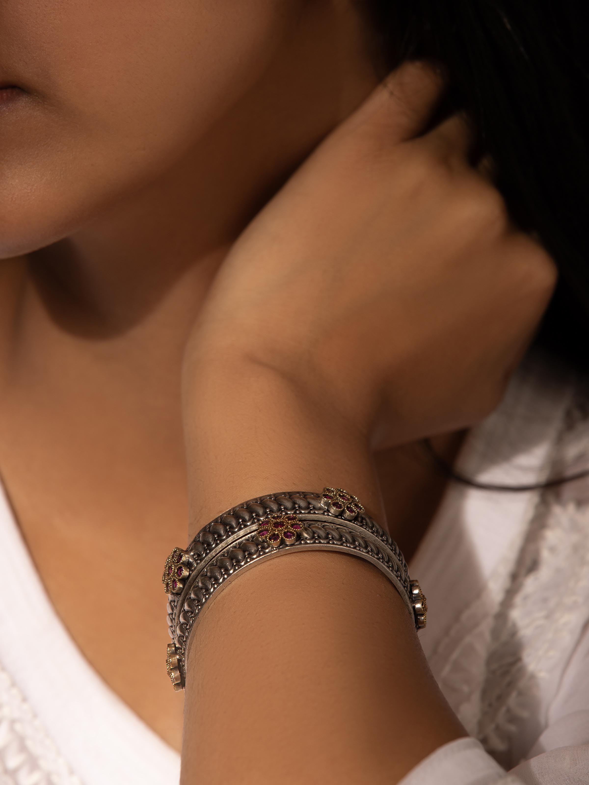 Side view of Silver Smithing bangle highlighting its sleek, sophisticated profile