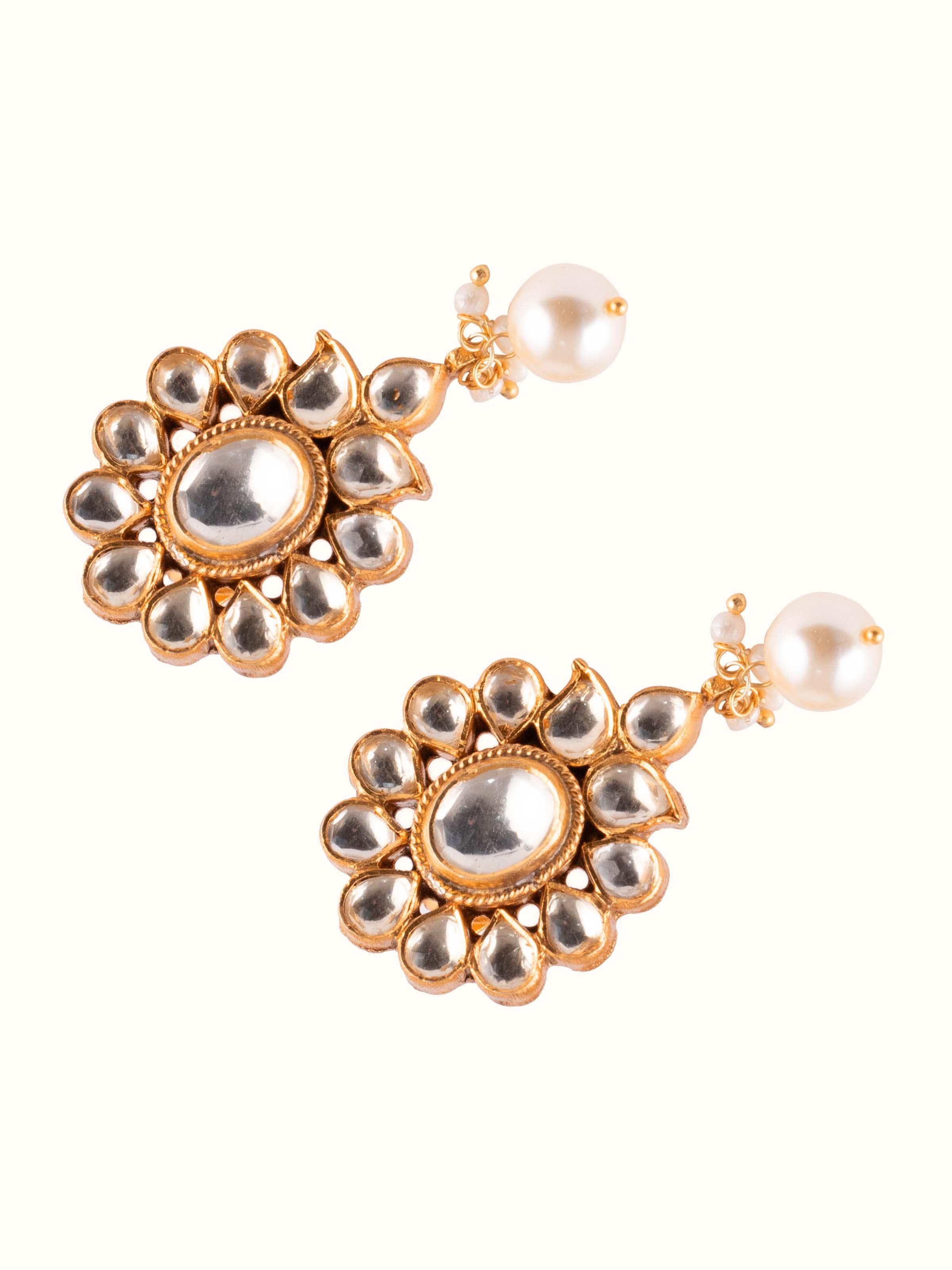 Angled view of Silver Smithing Drops emphasizing fine silverwork and design.