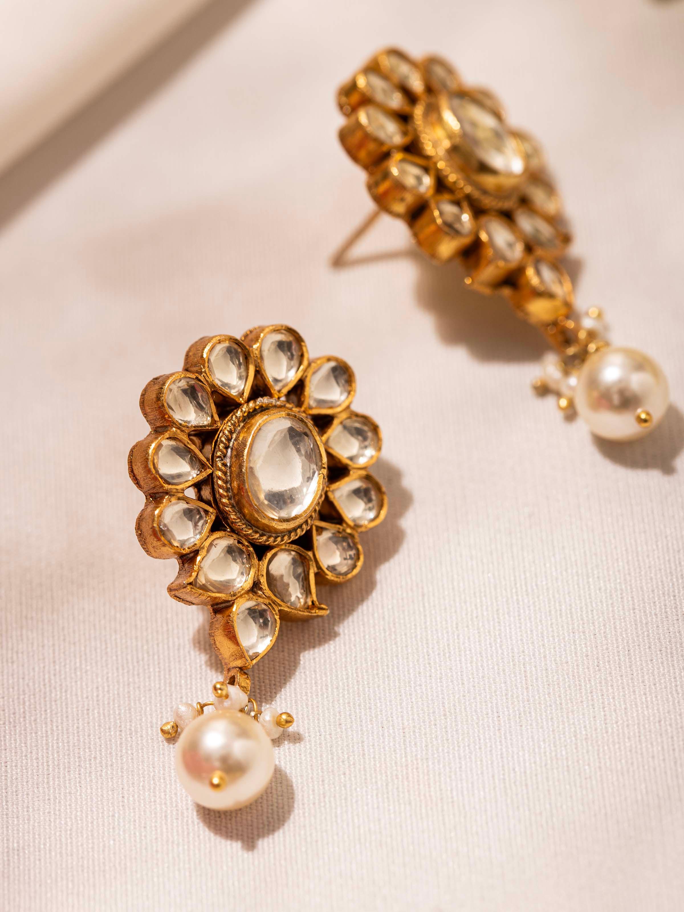 Detailed view of Silver Smithing Drops focusing on intricate silver design and details.