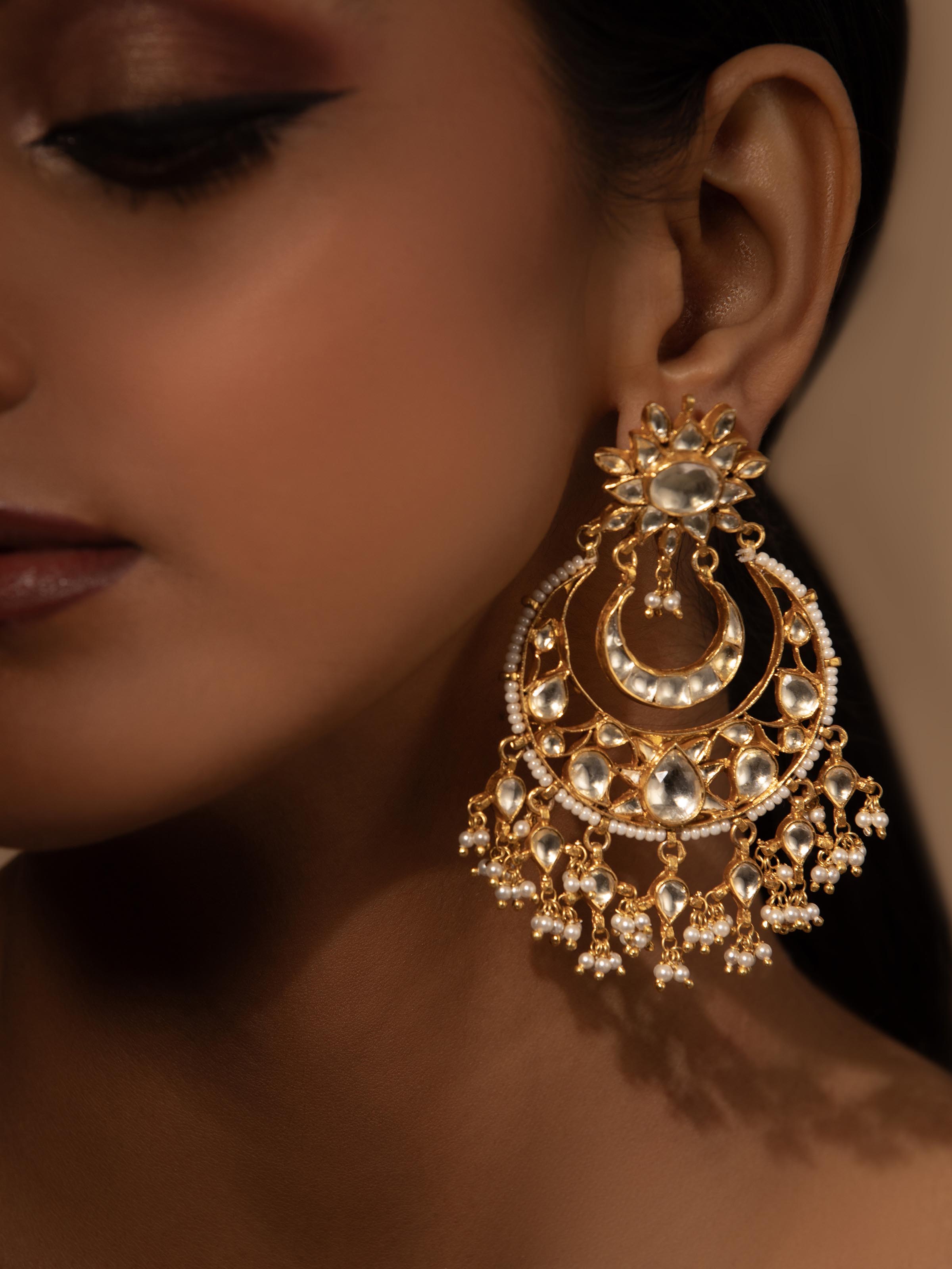 Side view of Silver Smithing Chandbalis showcasing its intricate design and detailed silver finish.