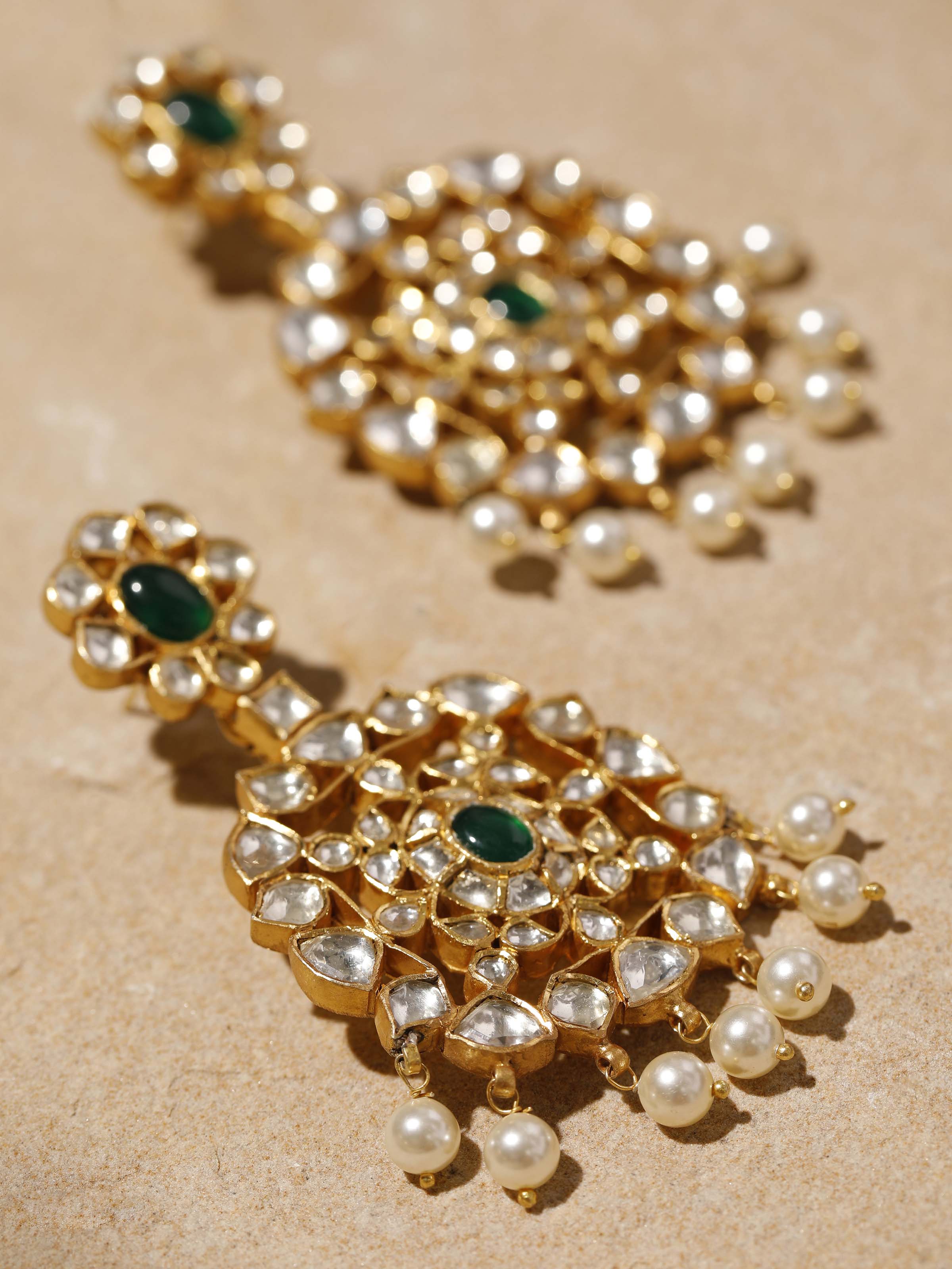 Side view of Silver Smithing Drop Earrings highlighting elegant design elements.